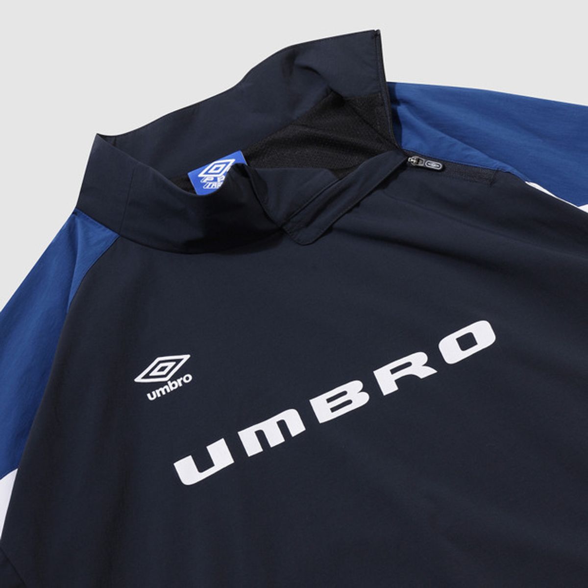 엄브로(UMBRO) PTR 하이넥 OCTA 피스테 네이비(UQ421SWTO4)