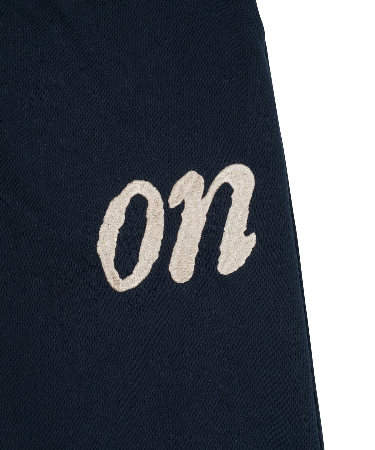더콜디스트모먼트(THE COLDEST MOMENT) TCM on sweat pants (navy)