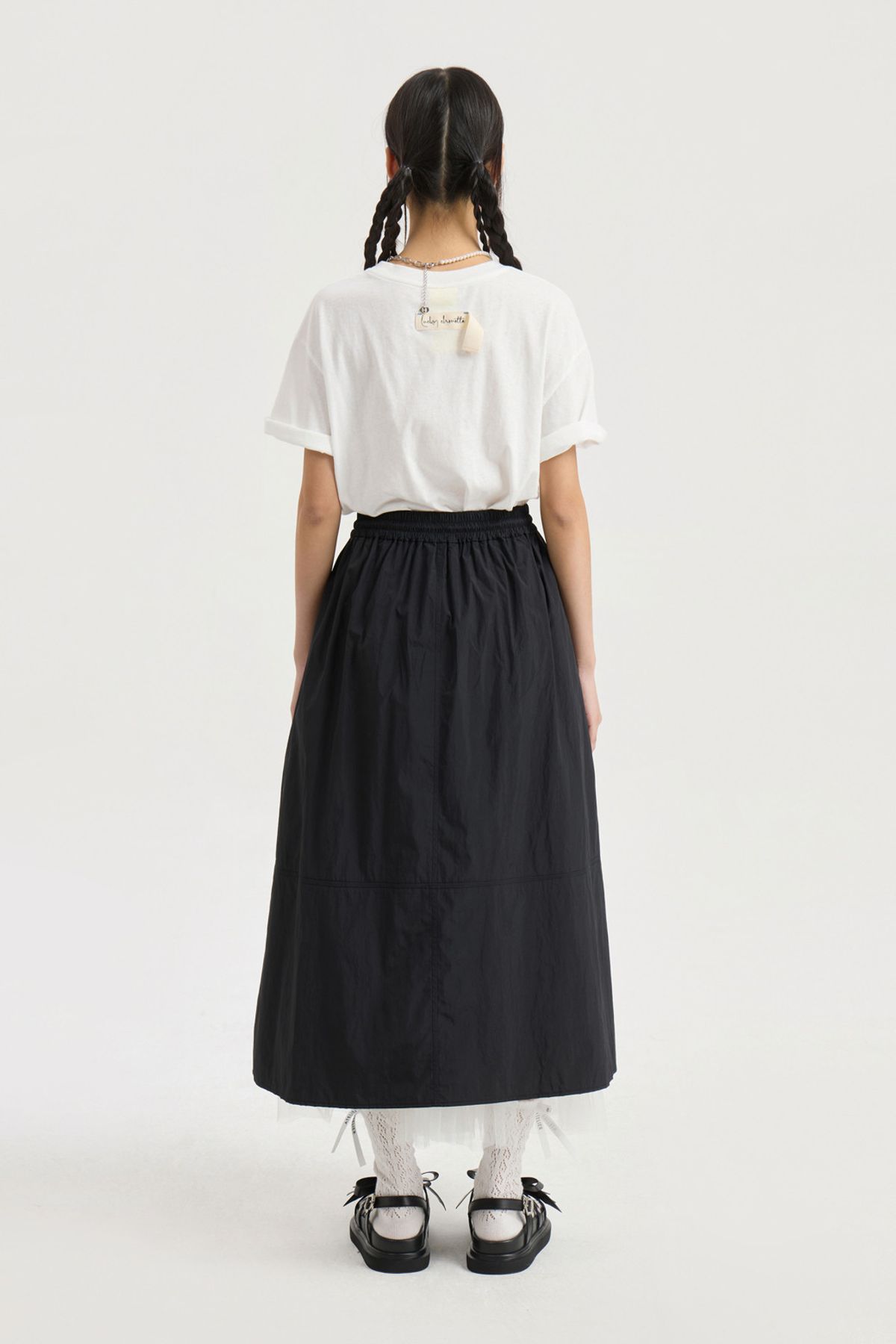 럭키슈에뜨(LUCKY CHOUETTE) Front Zipper A Line Banding Long Skirt (black) LFKAM25430BKX
