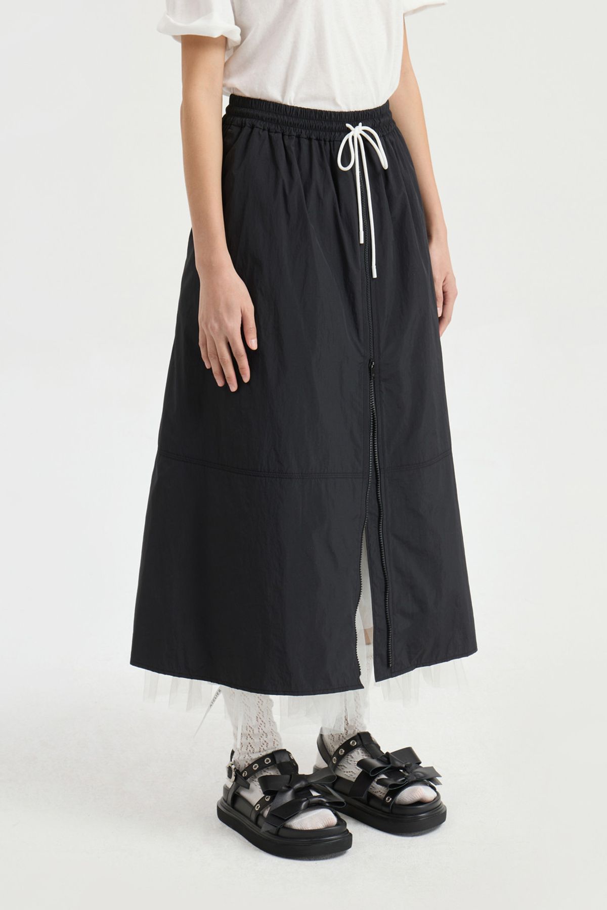 럭키슈에뜨(LUCKY CHOUETTE) Front Zipper A Line Banding Long Skirt (black) LFKAM25430BKX