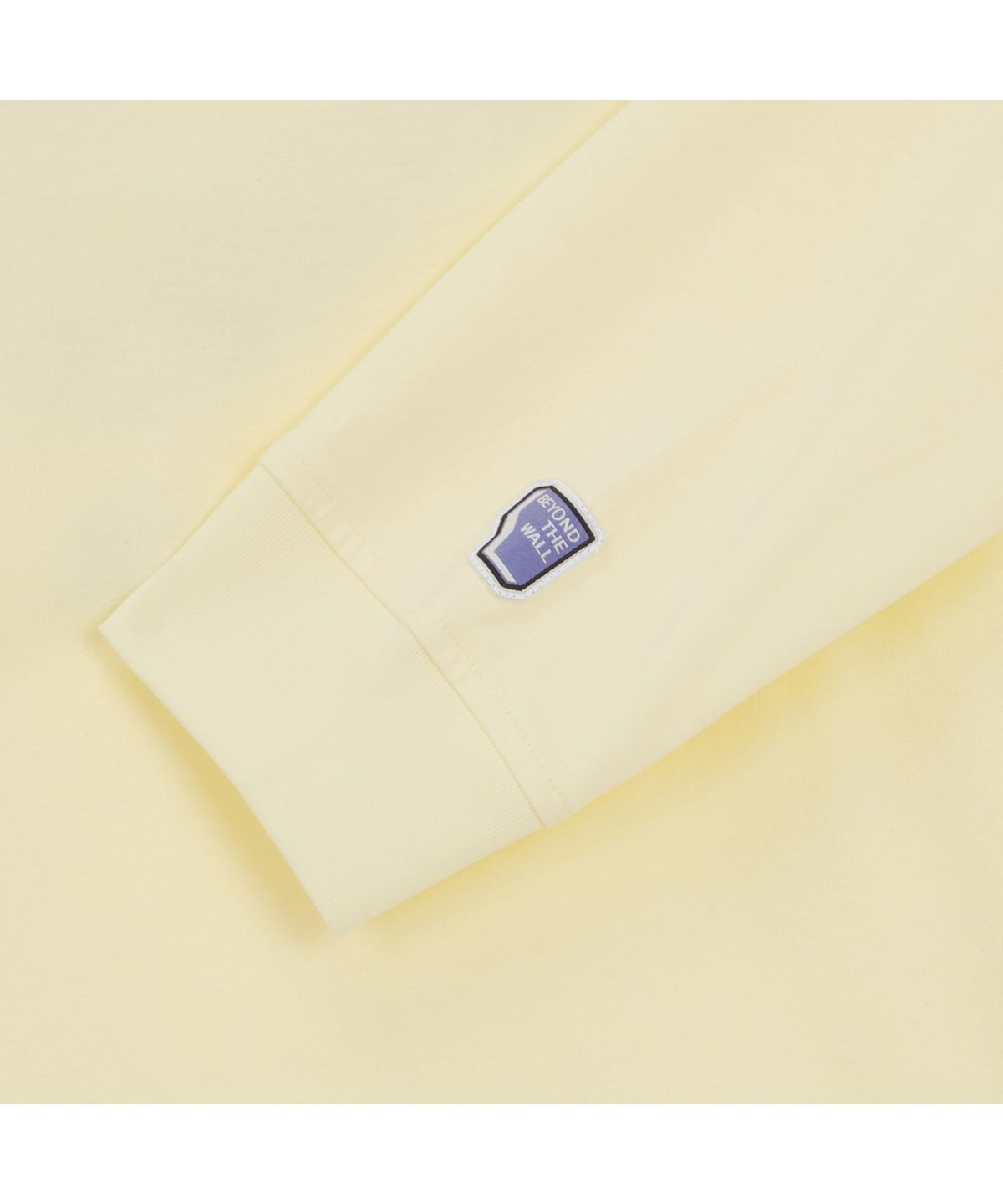 노스페이스(THE NORTH FACE) NT7TR70C 남성 카라비너 긴팔 티셔츠 PASTEL_YELLOW