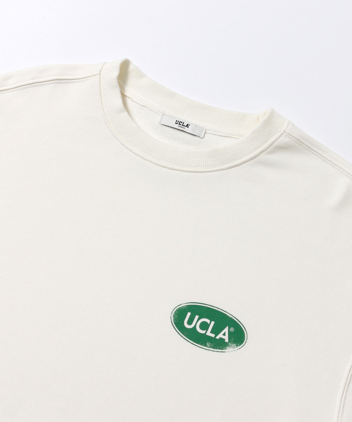 유씨엘에이(UCLA) 오버핏 로고 스웻셔츠[O-WHITE](UBRLTA1)