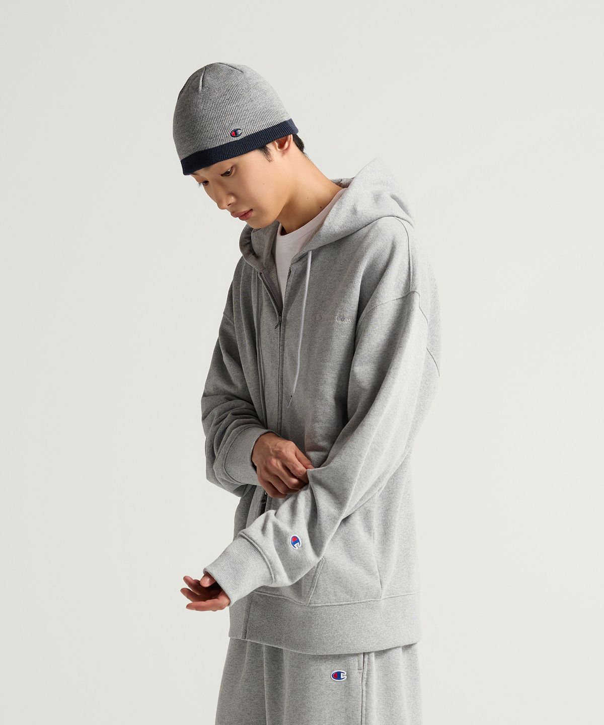 챔피온(CHAMPION) 스몰 로고 루즈핏 후드 집업 Grey