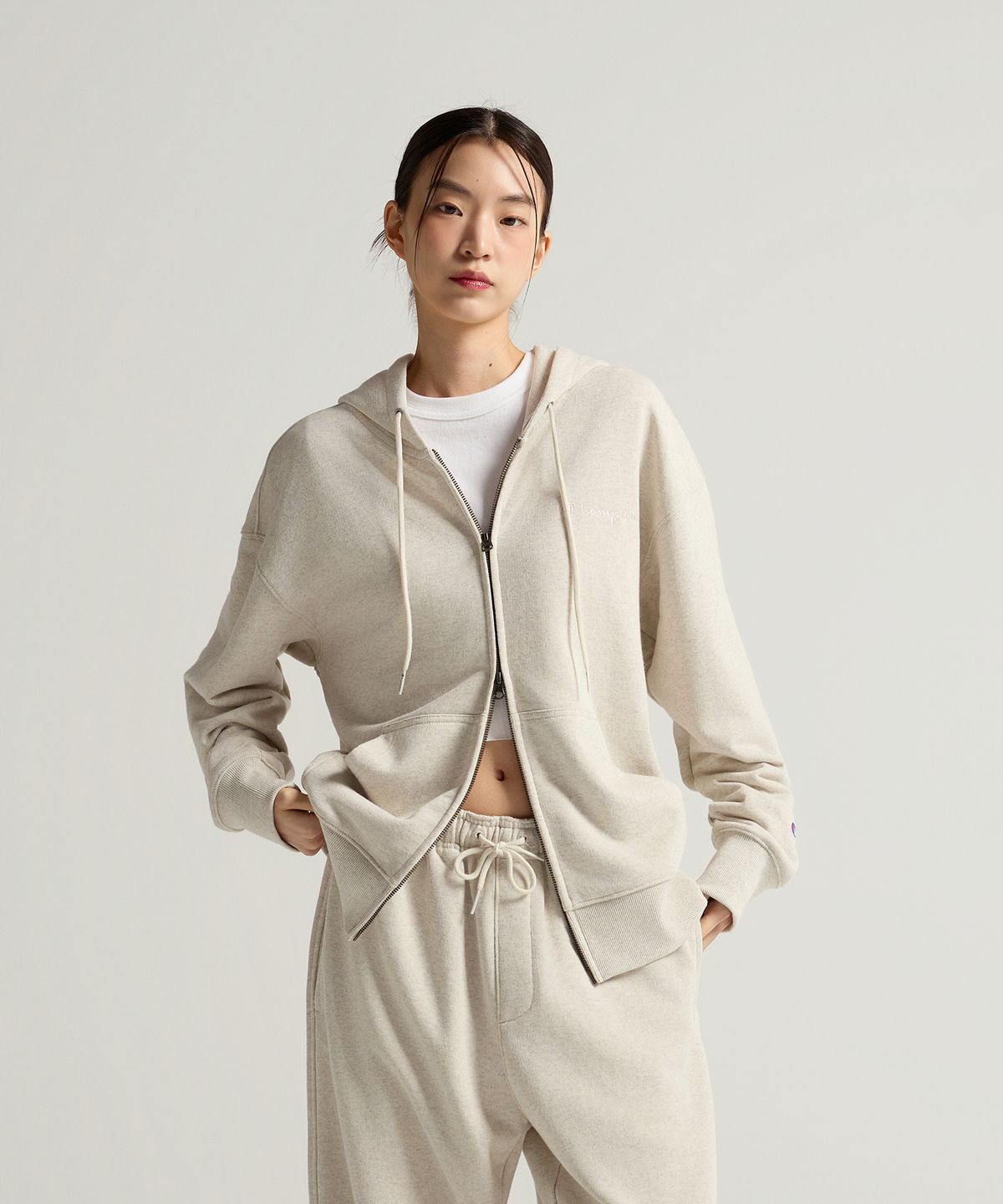 챔피온(CHAMPION) 스몰 로고 루즈핏 후드 집업 Oatmeal