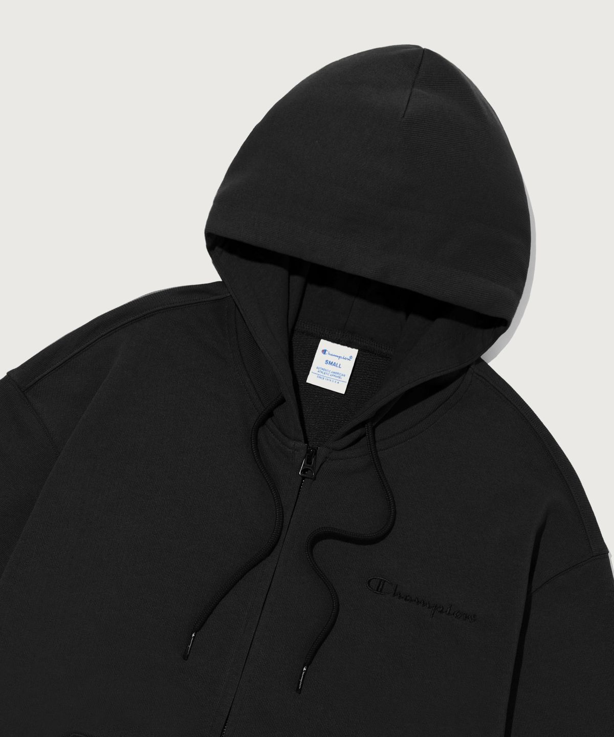 챔피온(CHAMPION) 스몰 로고 루즈핏 후드 집업 Black