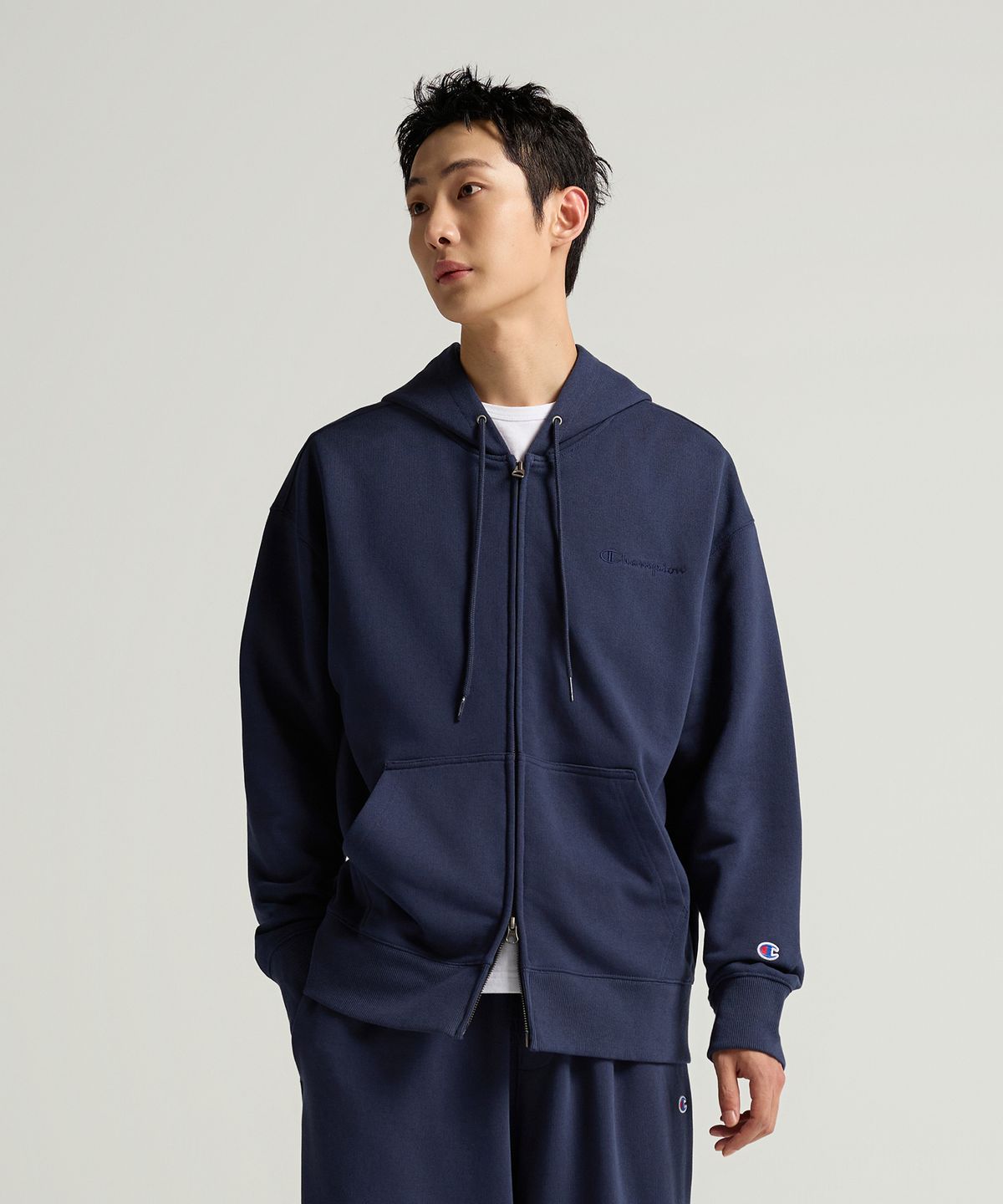 챔피온(CHAMPION) 스몰 로고 루즈핏 후드 집업 Navy