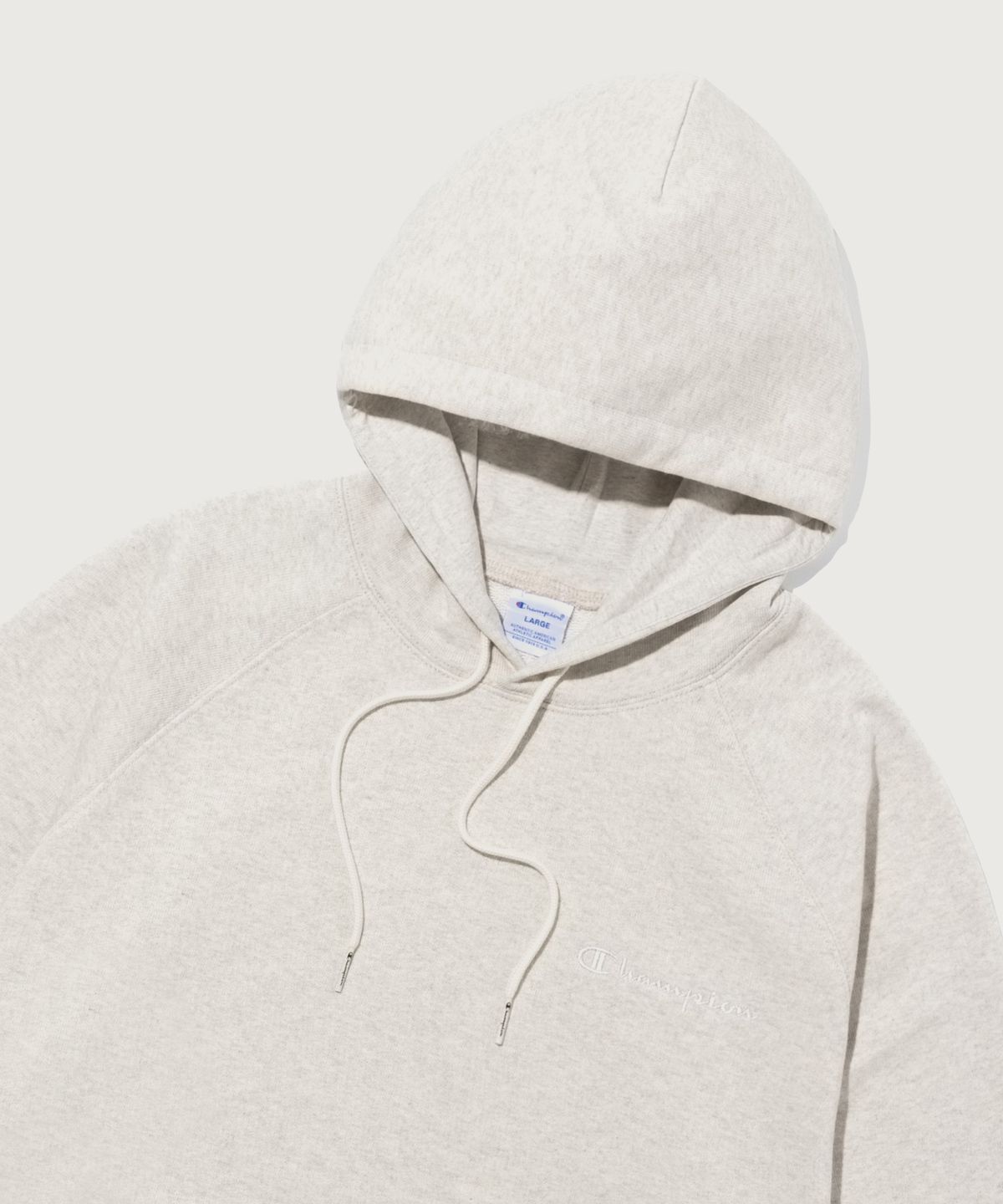 챔피온(CHAMPION) 스몰 로고 루즈핏 후드 티셔츠 Oatmeal