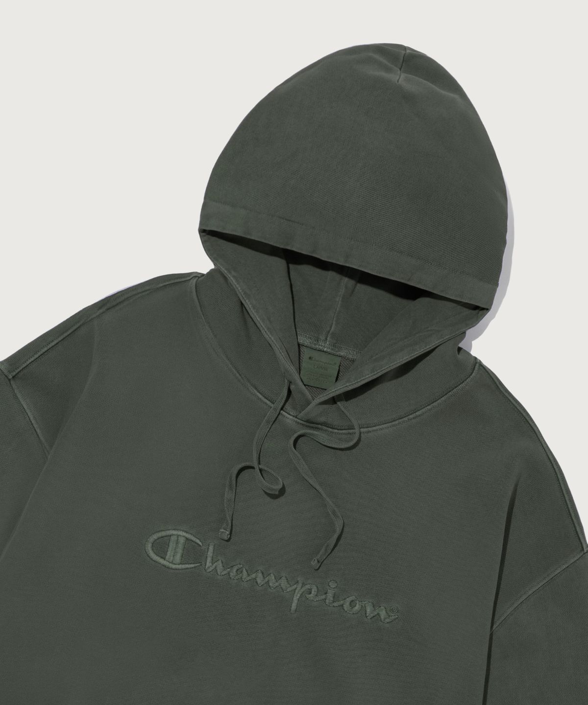 챔피온(CHAMPION) 빅 로고 피그먼트 오버핏 후드 티셔츠 Green