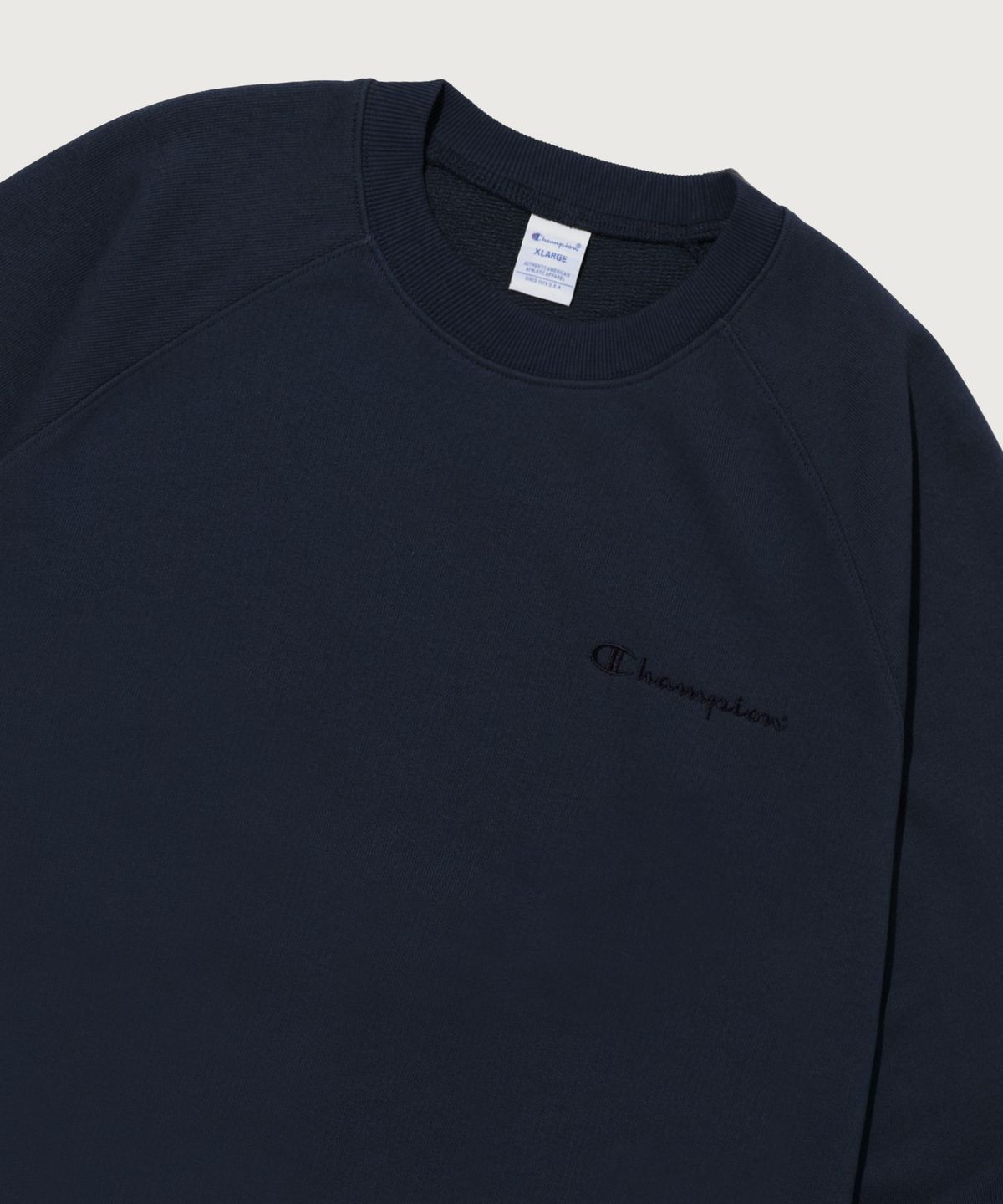 챔피온(CHAMPION) 스몰 로고 루즈핏 스웨트셔츠 Navy