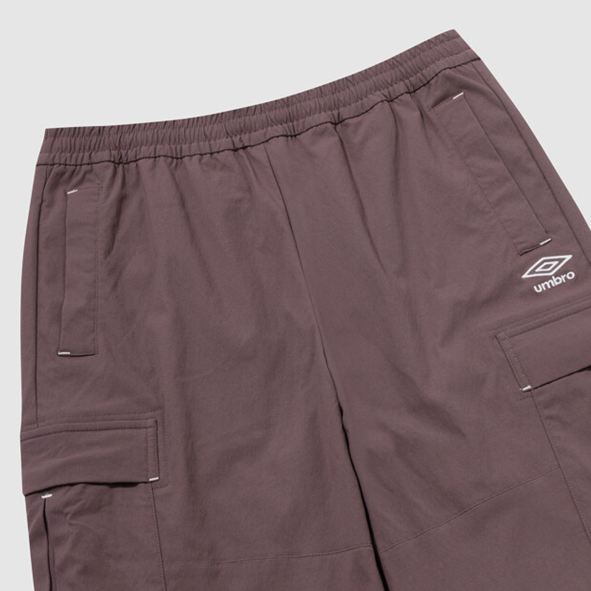 엄브로(UMBRO) 면터치 나일론 카고 스트레이트 팬츠 브라운(UQ323CPT95)