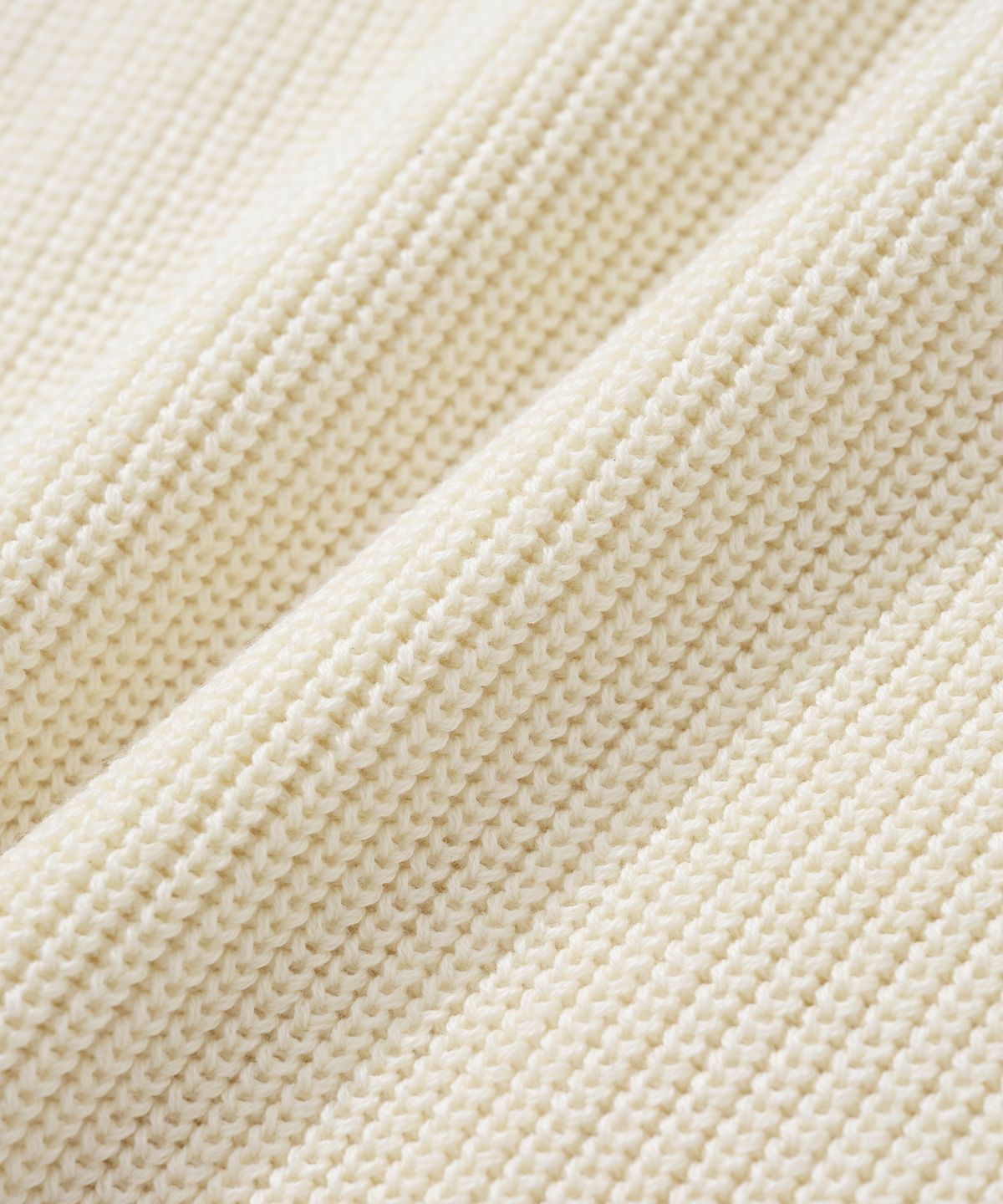니티드(KNITTED) 코튼 와플 라운드 니트 CREAM