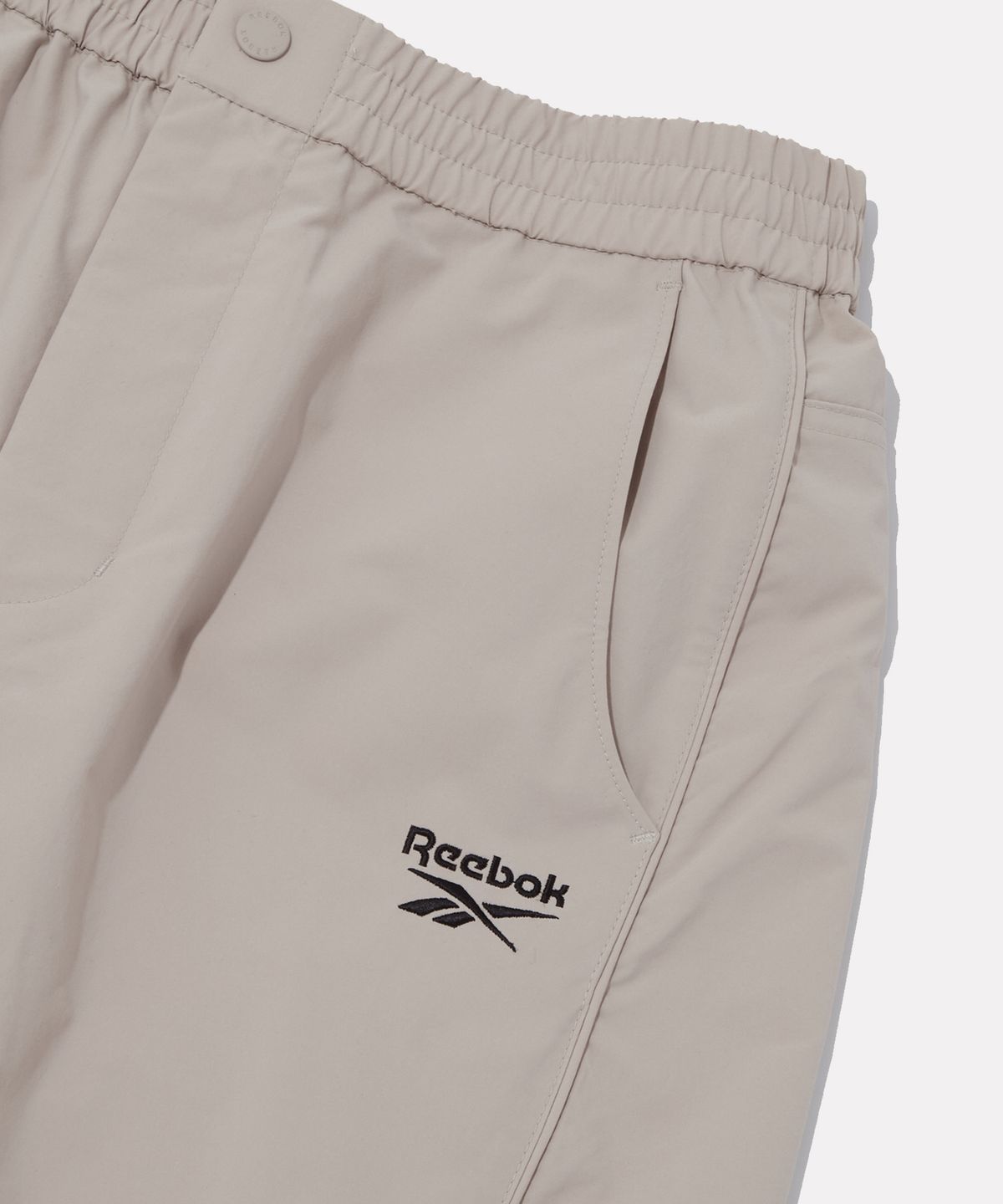 리복(REEBOK) 멀티 포켓 카고 팬츠 (W) - 아이보리