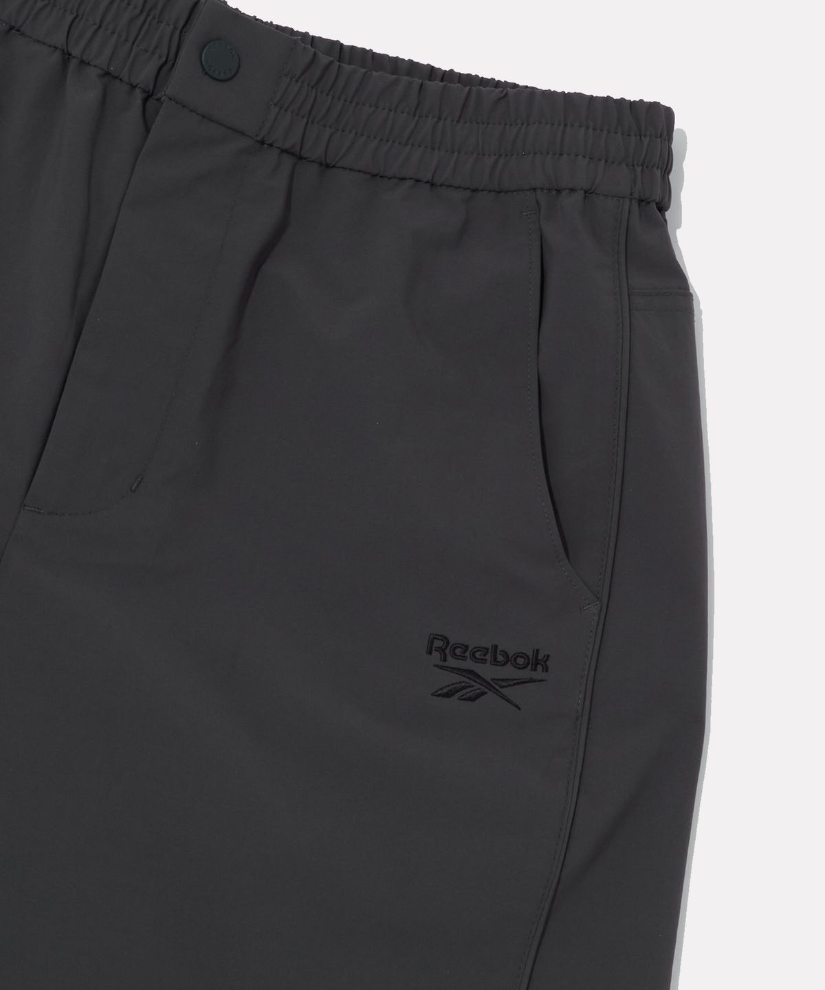 리복(REEBOK) 멀티 포켓 카고 팬츠 (W) - 차콜