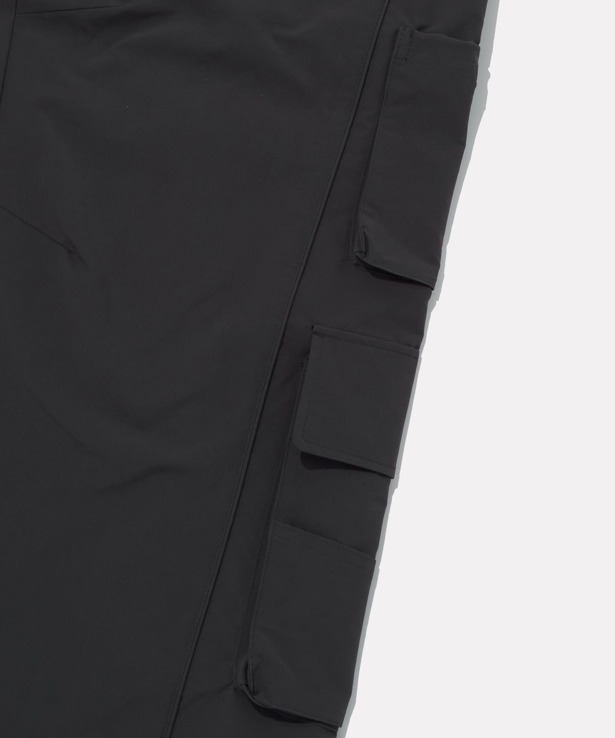 리복(REEBOK) 멀티 포켓 카고 팬츠 (W) - 차콜