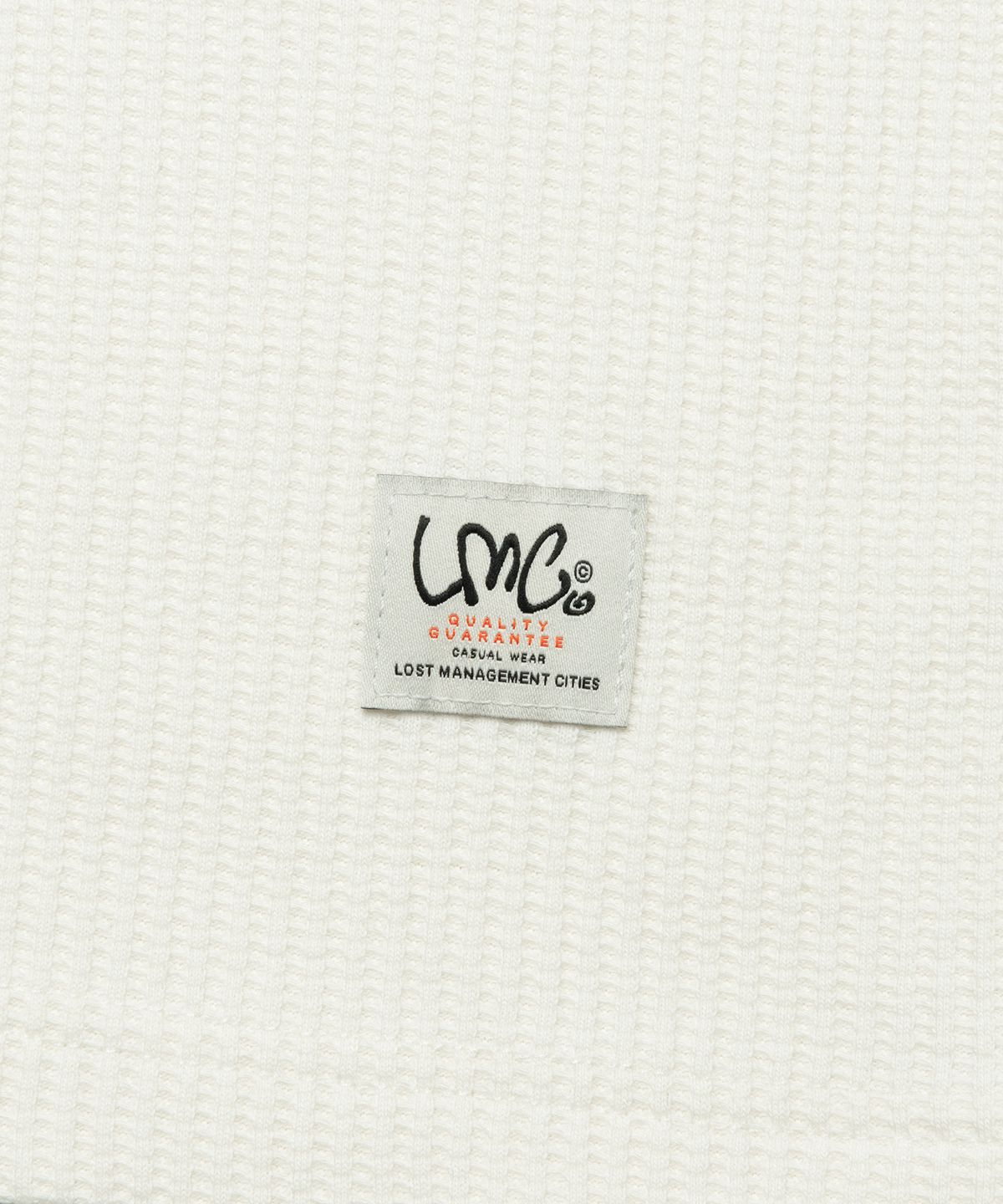 엘엠씨(LMC) HENLEY NECK WAFFLE LONG SLV TEE ivory