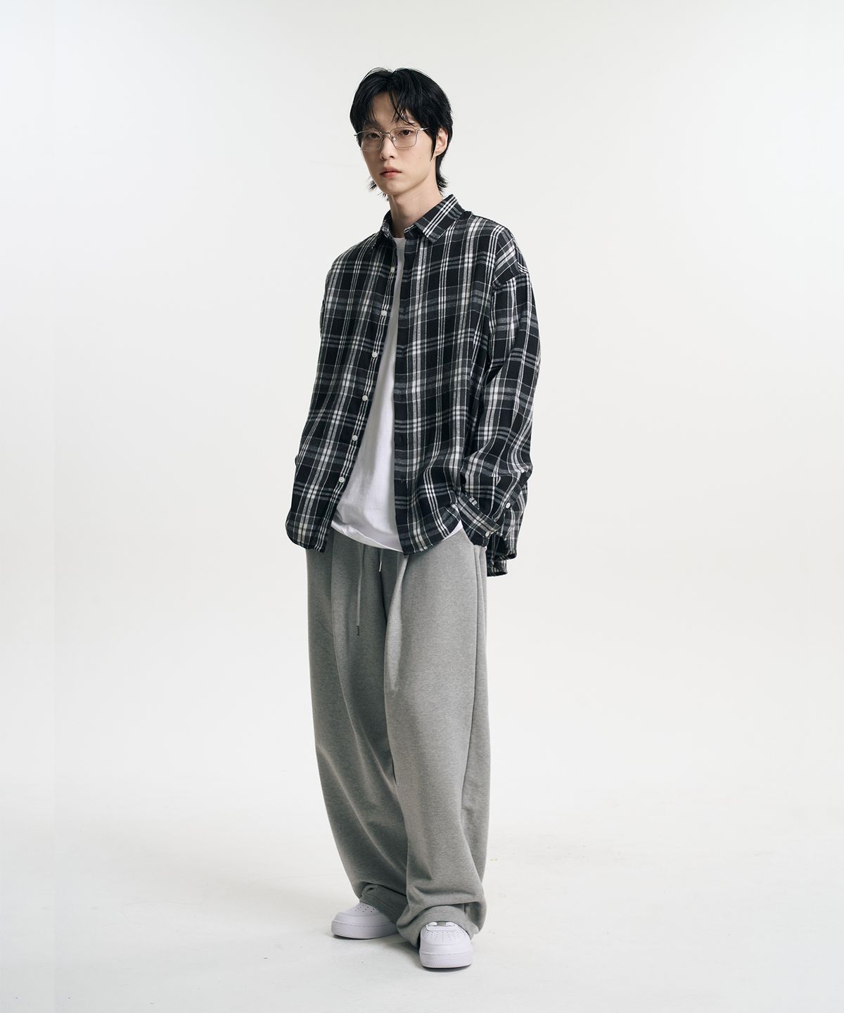 무븐(MOOVN) 오버핏 체크 셔츠 블랙