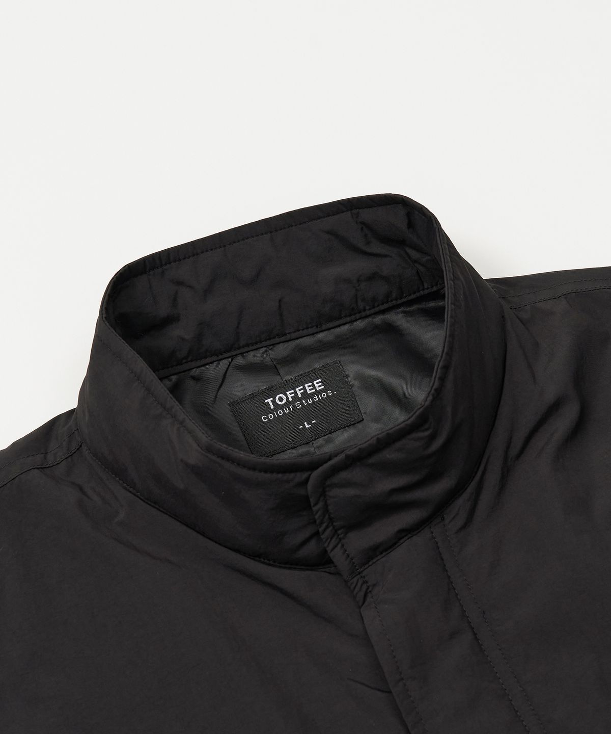 토피(TOFFEE) 유틸리티 피쉬테일 롱 파카 (BLACK)