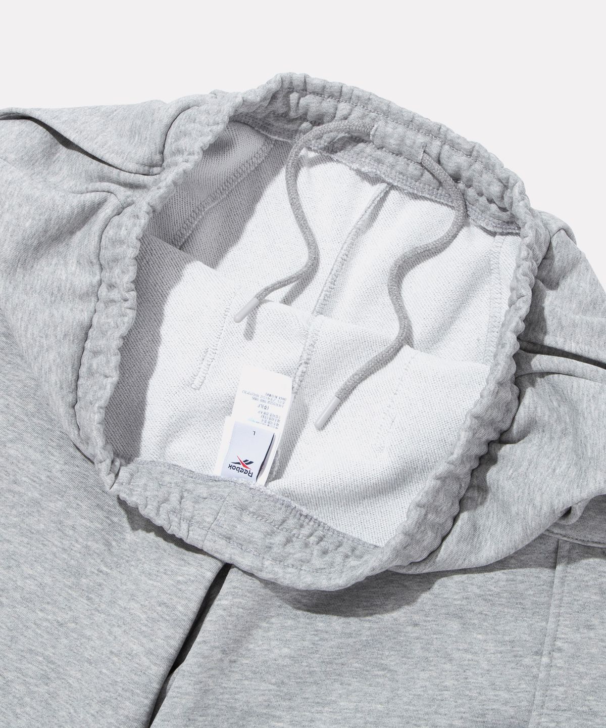 리복(REEBOK) 스웨트 버뮤다 쇼츠 - 그레이