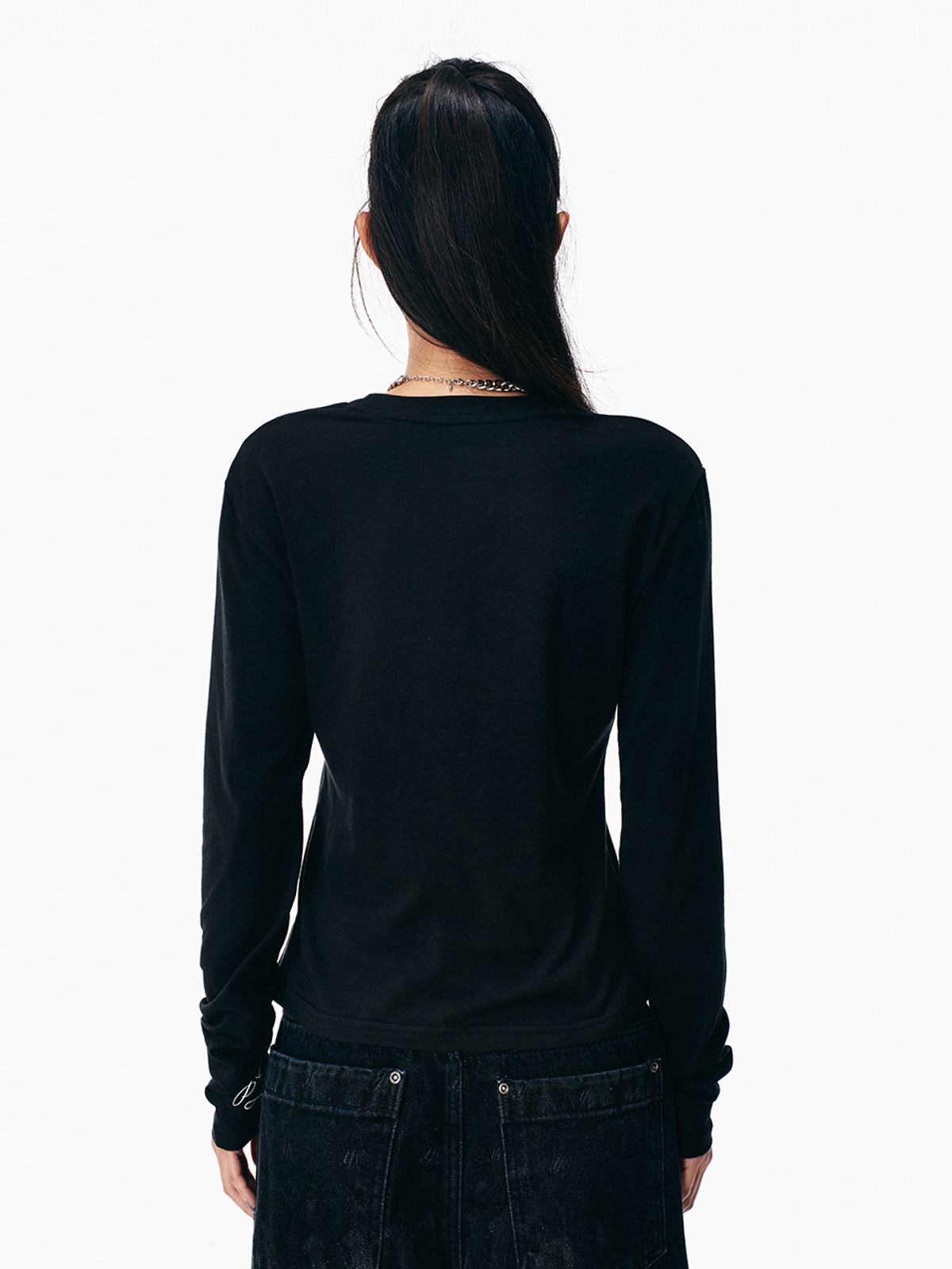 와이이이엘(YEEL) WING LETTERING LONG SLEEVE TOP BLACK