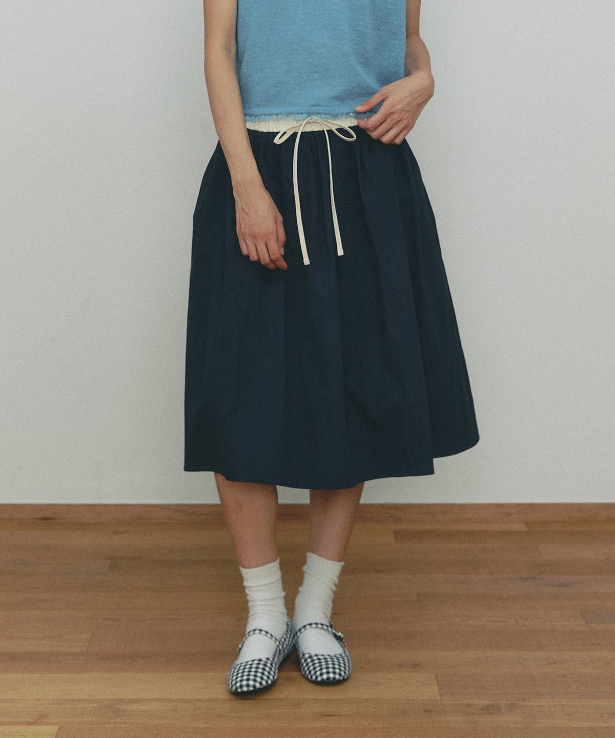 쎄미(SSEMI) BANDING ROPE MIDI SKIRT(NV)