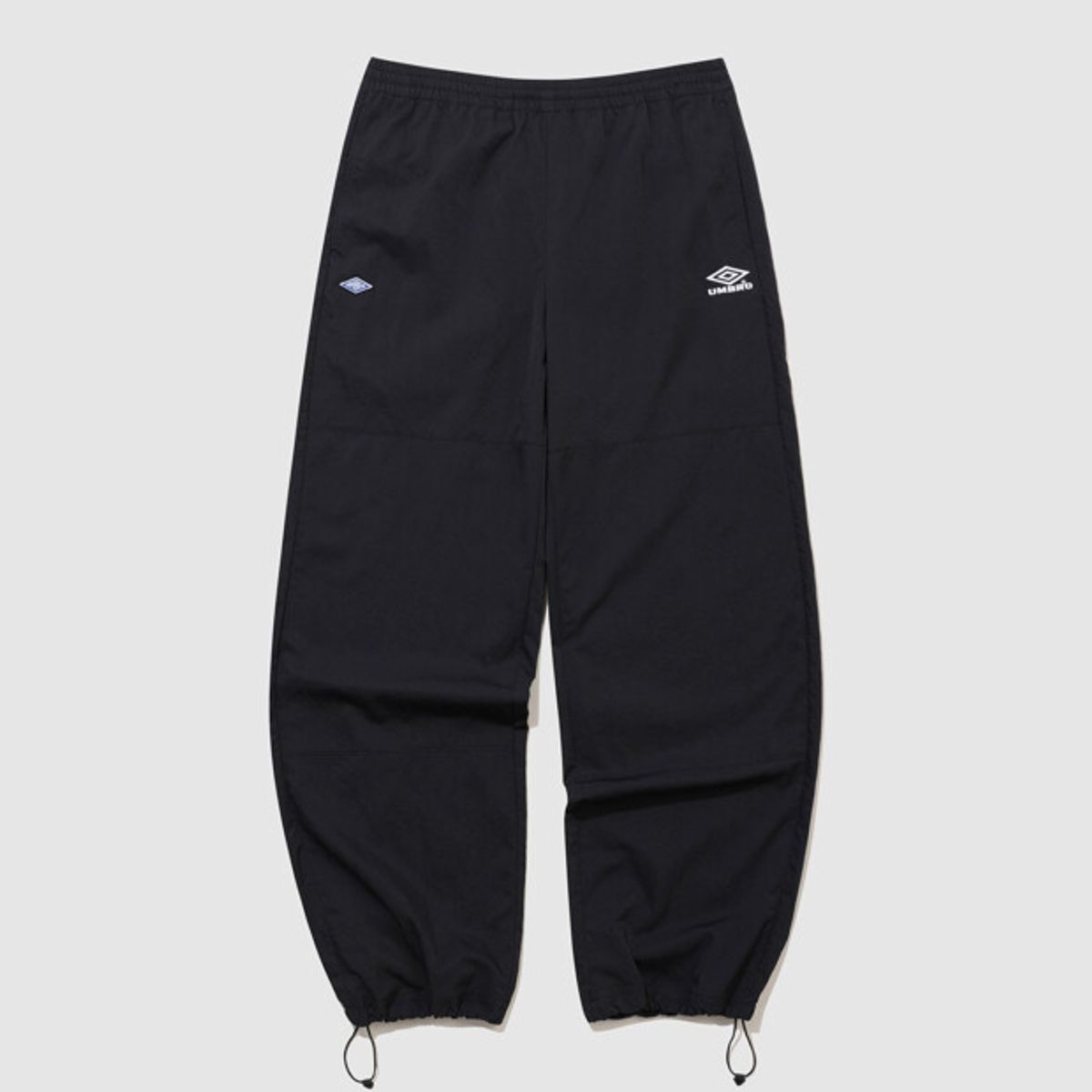 엄브로(UMBRO) HBL 로얄 컬리지 와이드 & 조거 2WAY 우븐 팬츠 블랙(UQ321CPT99)