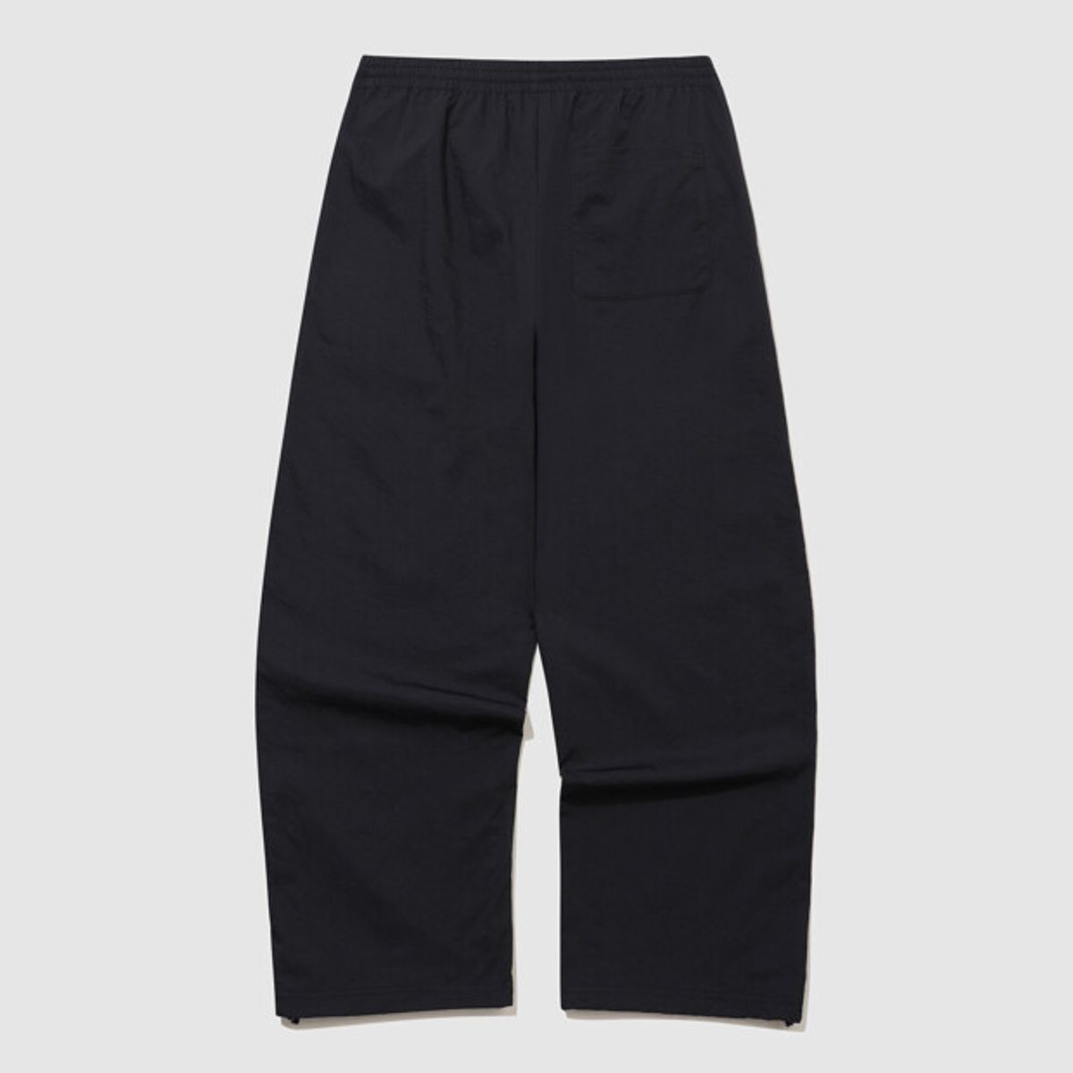 엄브로(UMBRO) HBL 로얄 컬리지 와이드 & 조거 2WAY 우븐 팬츠 블랙(UQ321CPT99)