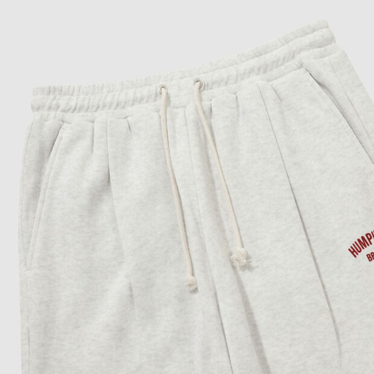 엄브로(UMBRO) HBL 로얄 컬리지 와이드 & 조거 2WAY 스웨트 팬츠 아이보리(UQ321CFP99)