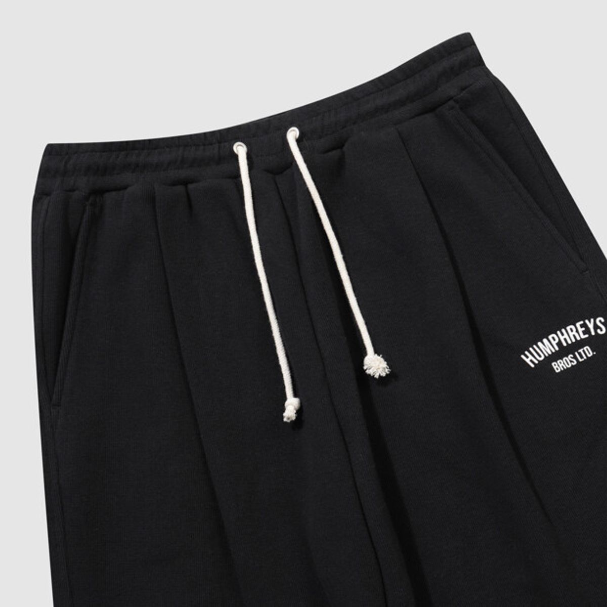 엄브로(UMBRO) HBL 로얄 컬리지 와이드 & 조거 2WAY 스웨트 팬츠 블랙(UQ321CFP99)