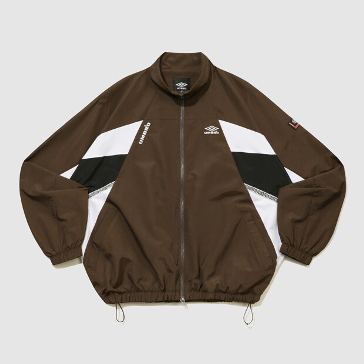 엄브로(UMBRO) HBL OG 헤리티지 스탠넥 바람막이 자켓 브라운(UQ321CJK97)