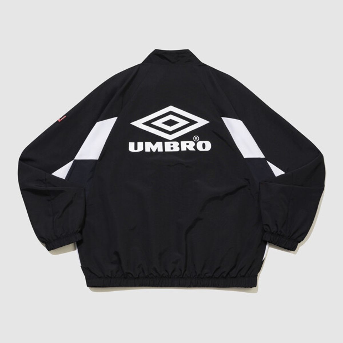 엄브로(UMBRO) HBL OG 헤리티지 스탠넥 바람막이 자켓 블랙(UQ321CJK97)