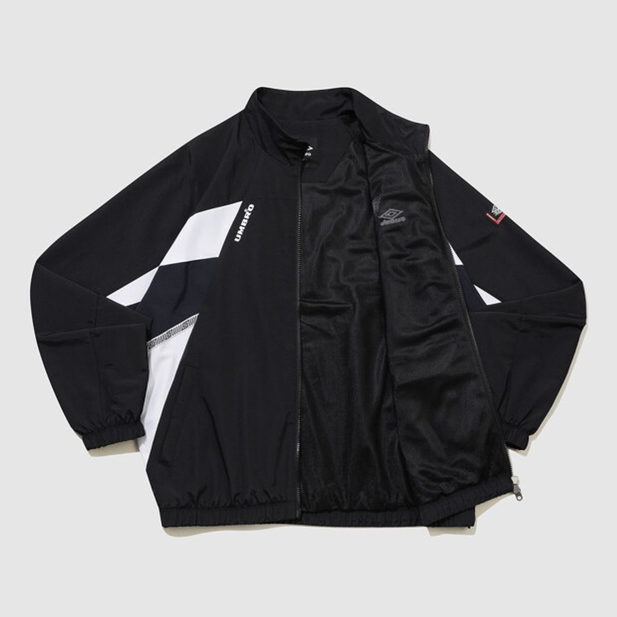 엄브로(UMBRO) HBL OG 헤리티지 스탠넥 바람막이 자켓 블랙(UQ321CJK97)