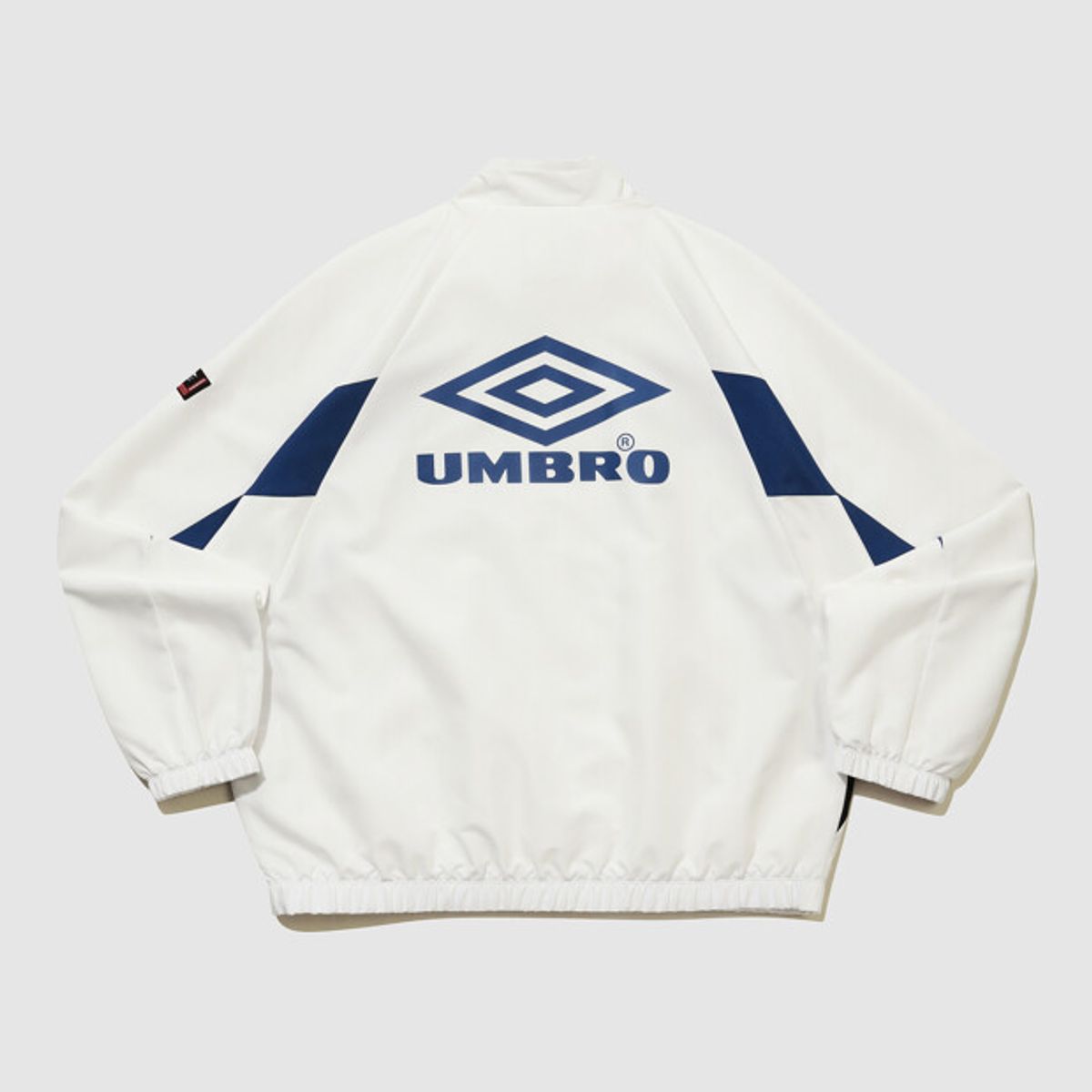 엄브로(UMBRO) HBL OG 헤리티지 스탠넥 바람막이 자켓 아이보리(UQ321CJK97)