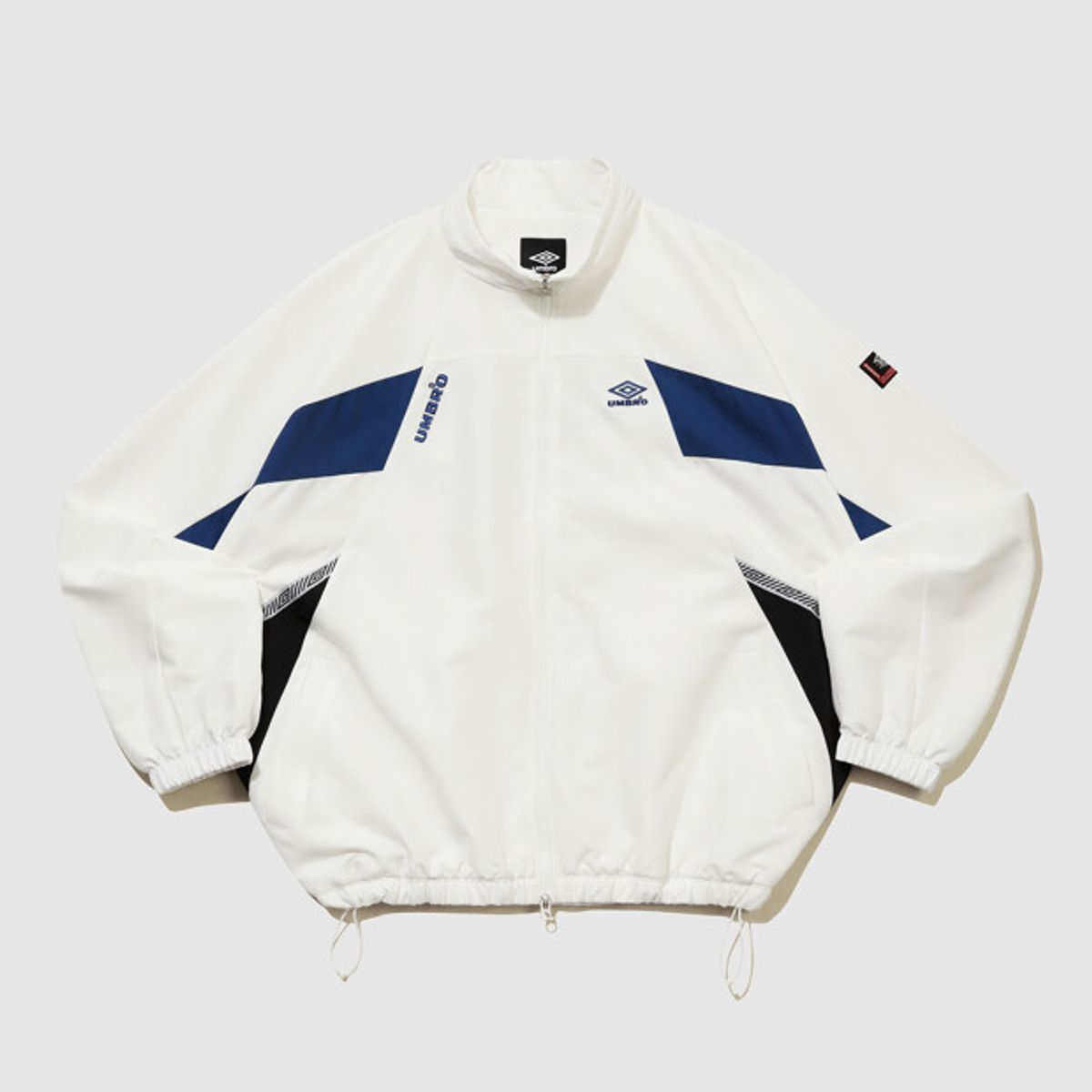 엄브로(UMBRO) HBL OG 헤리티지 스탠넥 바람막이 자켓 아이보리(UQ321CJK97)