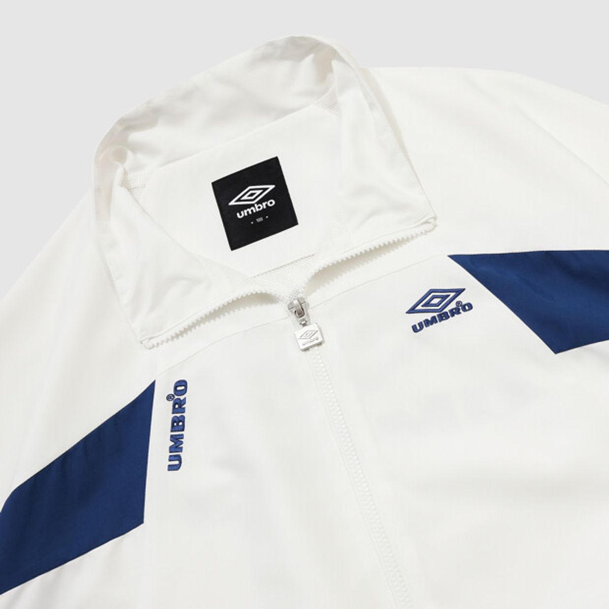 엄브로(UMBRO) HBL OG 헤리티지 스탠넥 바람막이 자켓 아이보리(UQ321CJK97)