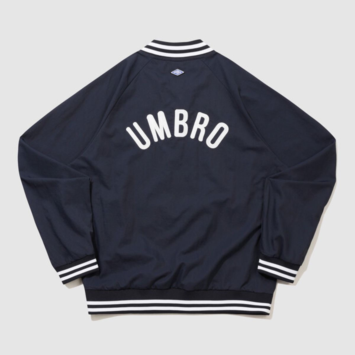 엄브로(UMBRO) HBL 로얄 컬리지 솔리드 피스테 네이비(UQ321CWT98)