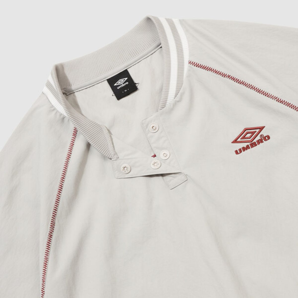 엄브로(UMBRO) HBL 로얄 컬리지 솔리드 피스테 베이지(UQ321CWT98)