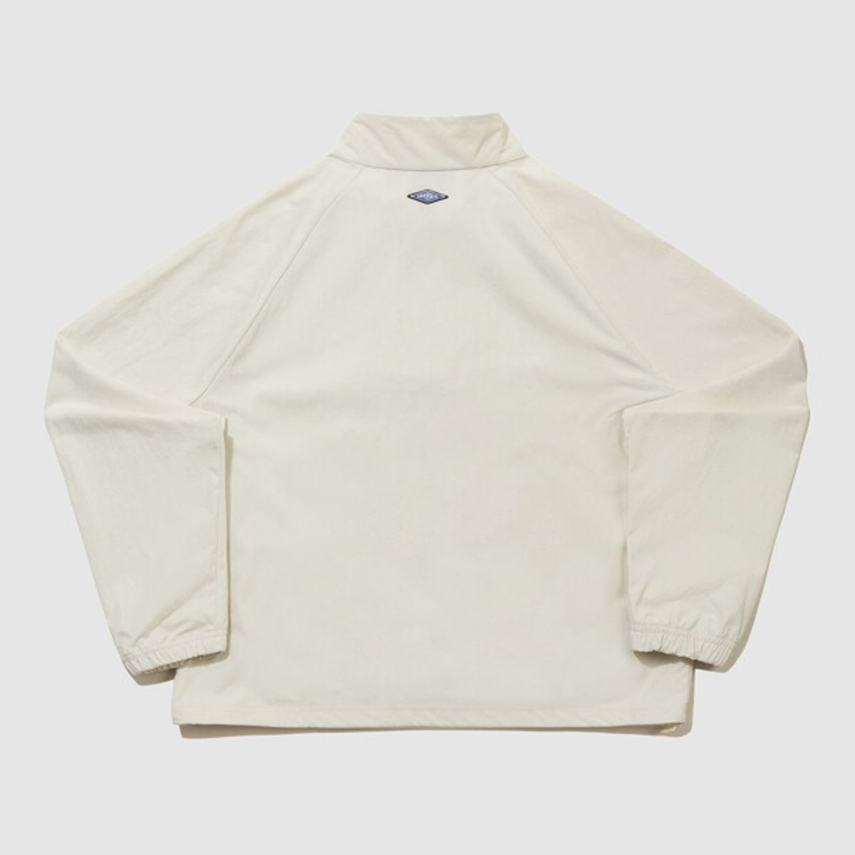 엄브로(UMBRO) HBL 로얄 컬리지 스탠넥 아노락 베이지(UQ323CWT99)