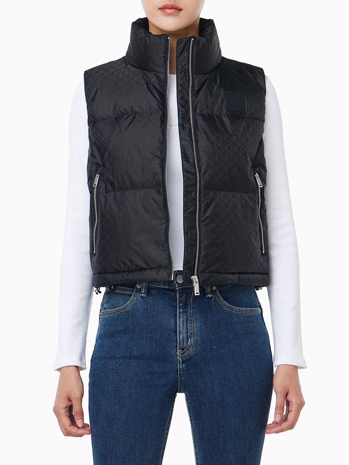 캘빈클라인 진(CALVIN KLEIN JEANS) 여성 AOP 로고 자카드 푸퍼 베스트 44D538G UB1
