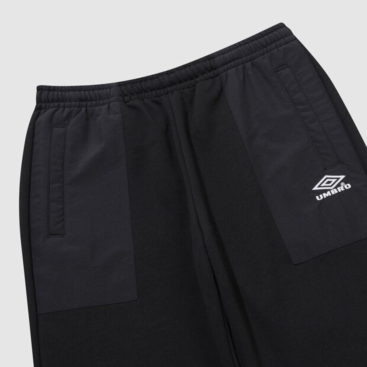 엄브로(UMBRO) HBL 하이브리드 니트 조거 팬츠 블랙(UQ321CFP97)
