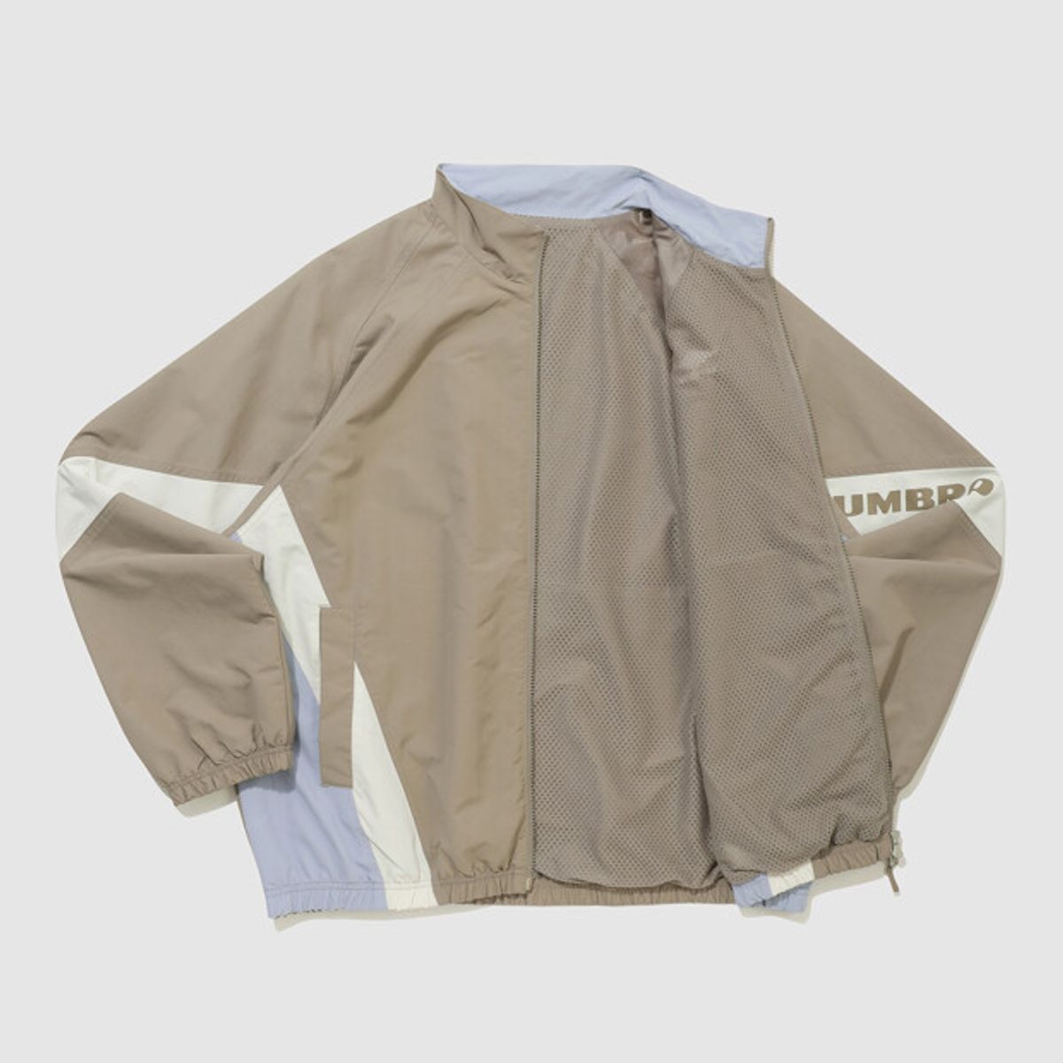 엄브로(UMBRO) 팝러쉬 기모 바람막이 자켓 베이지(UQ323CJK95)