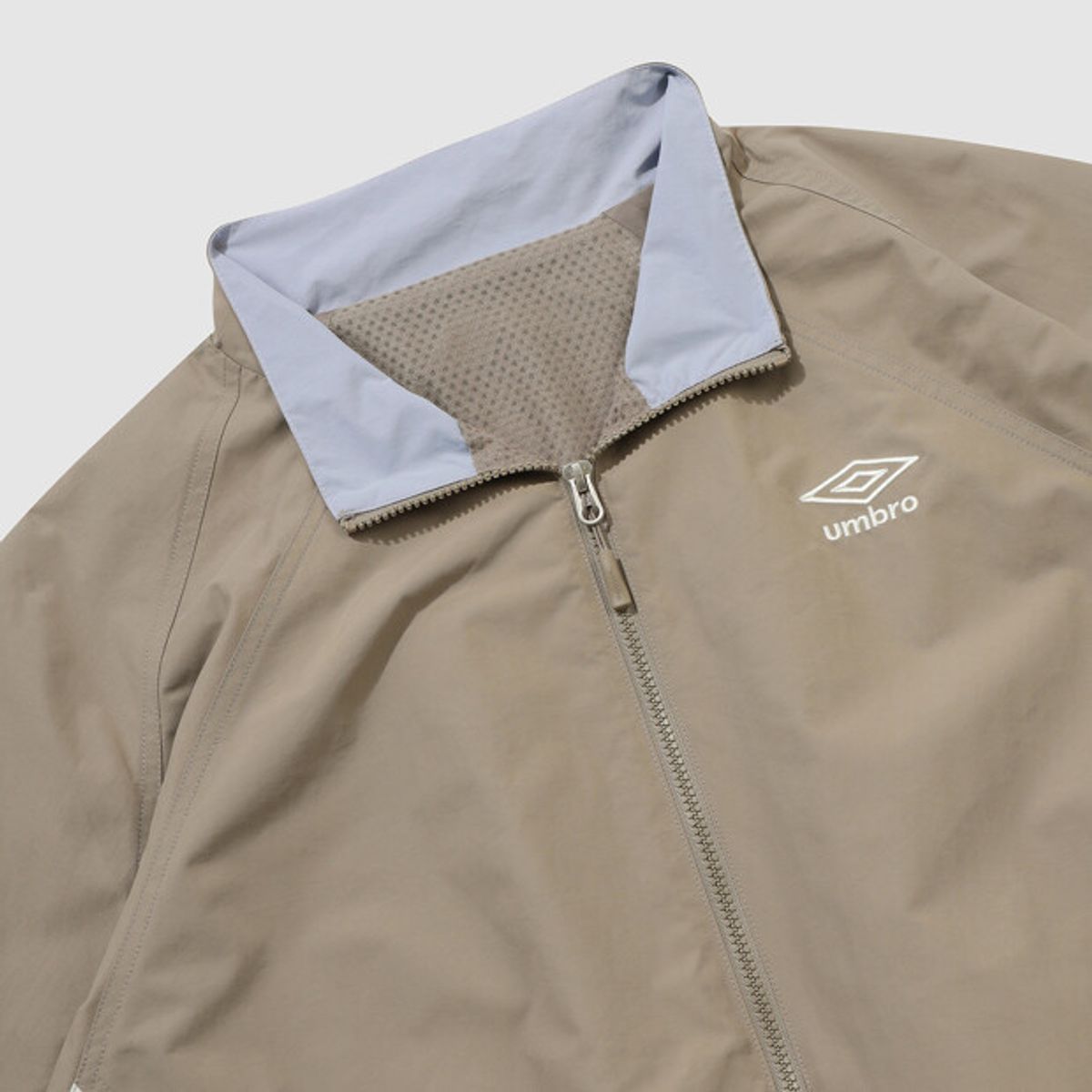 엄브로(UMBRO) 팝러쉬 기모 바람막이 자켓 베이지(UQ323CJK95)