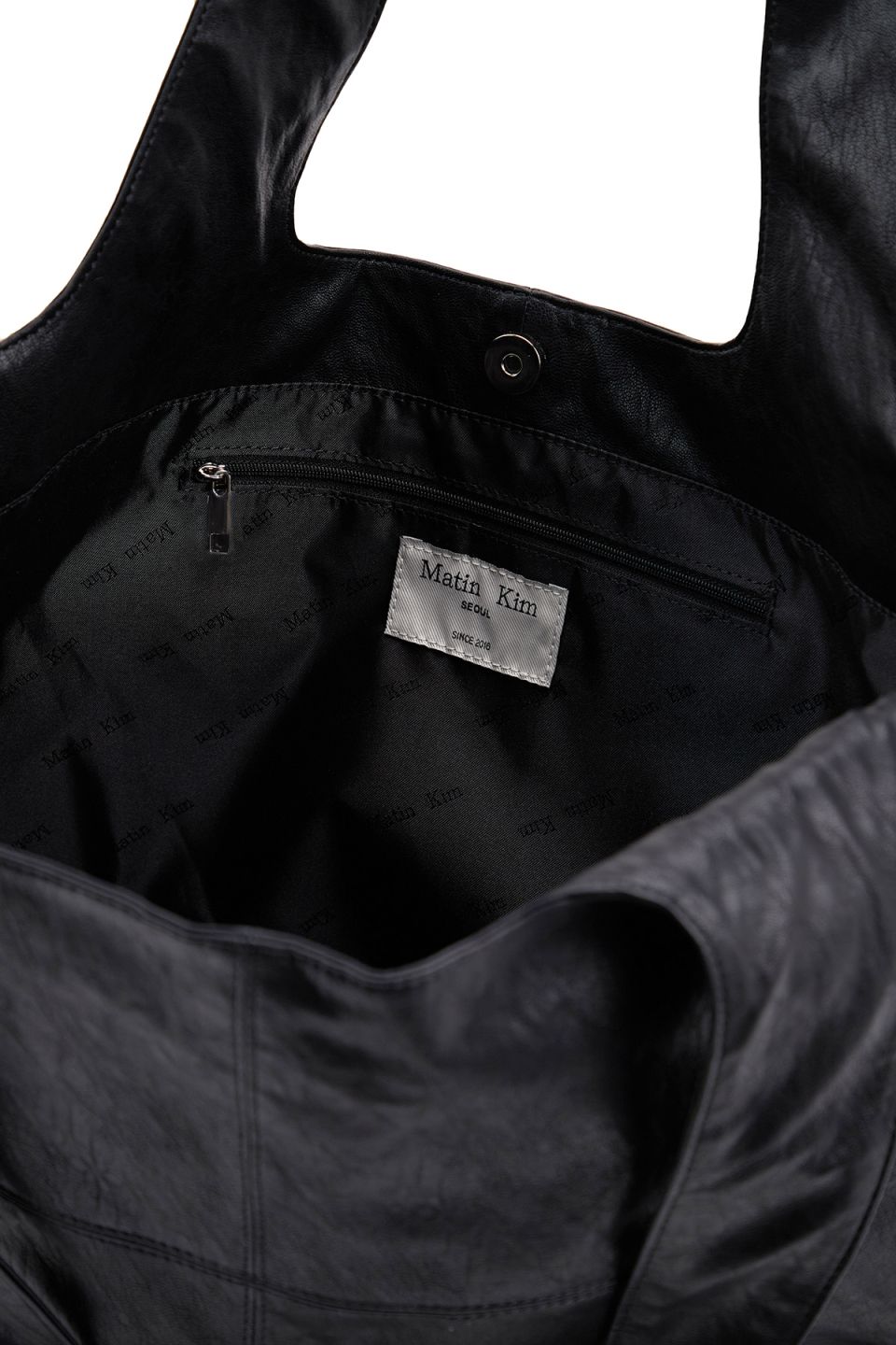 MUSINSA | MATIN KIM SIDE STRING LEATHER BIG SHOULDER BAG IN BLACK