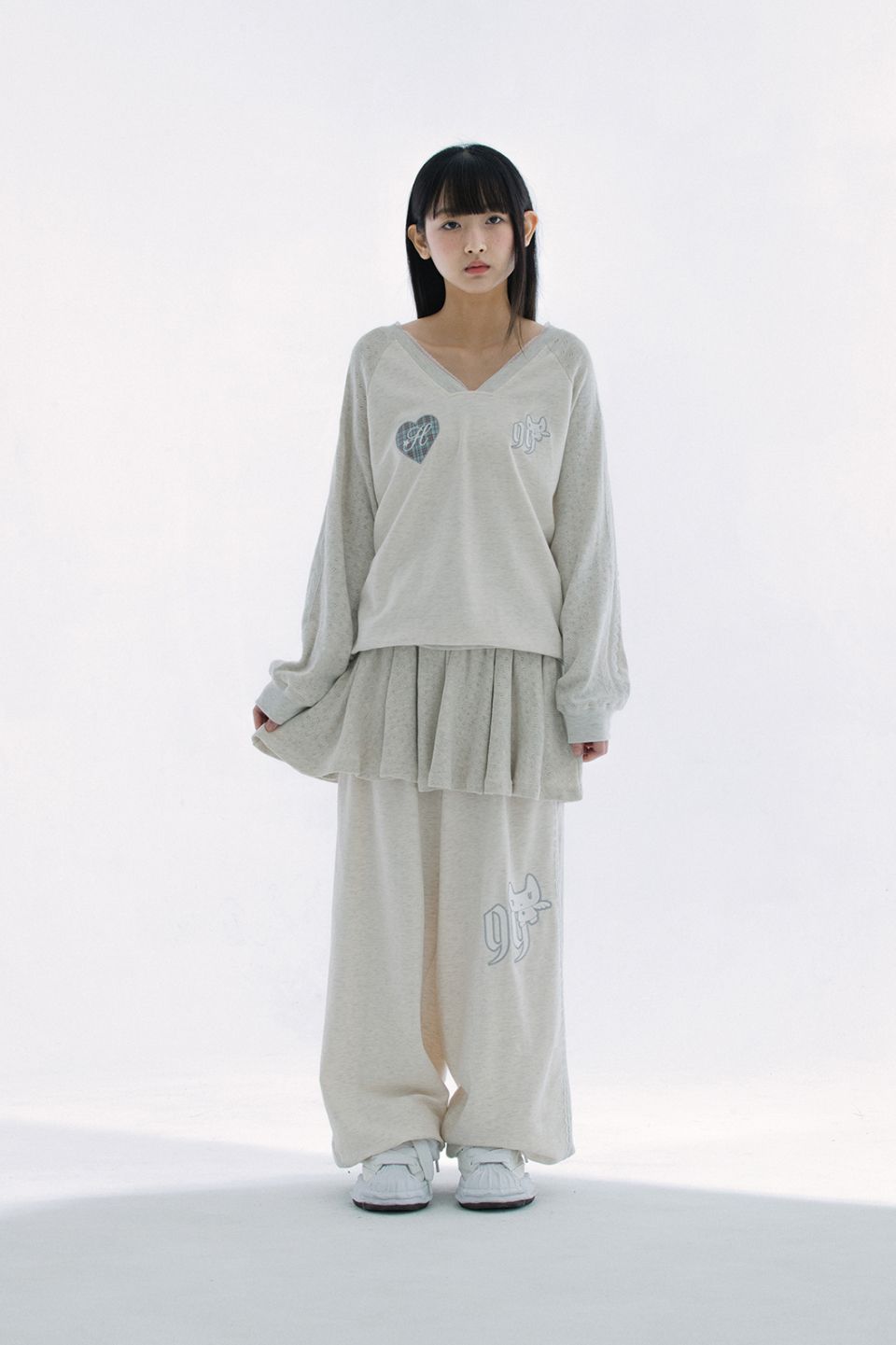 MUSINSA公式 | HUG YOUR SKIN パッチスカートレイヤードジョガーパンツ