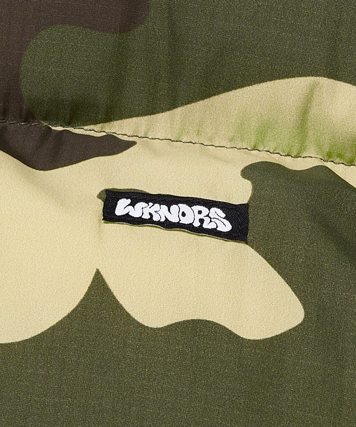 위캔더스(WKNDRS) PUZZLE PUFFER VEST (CAMO)