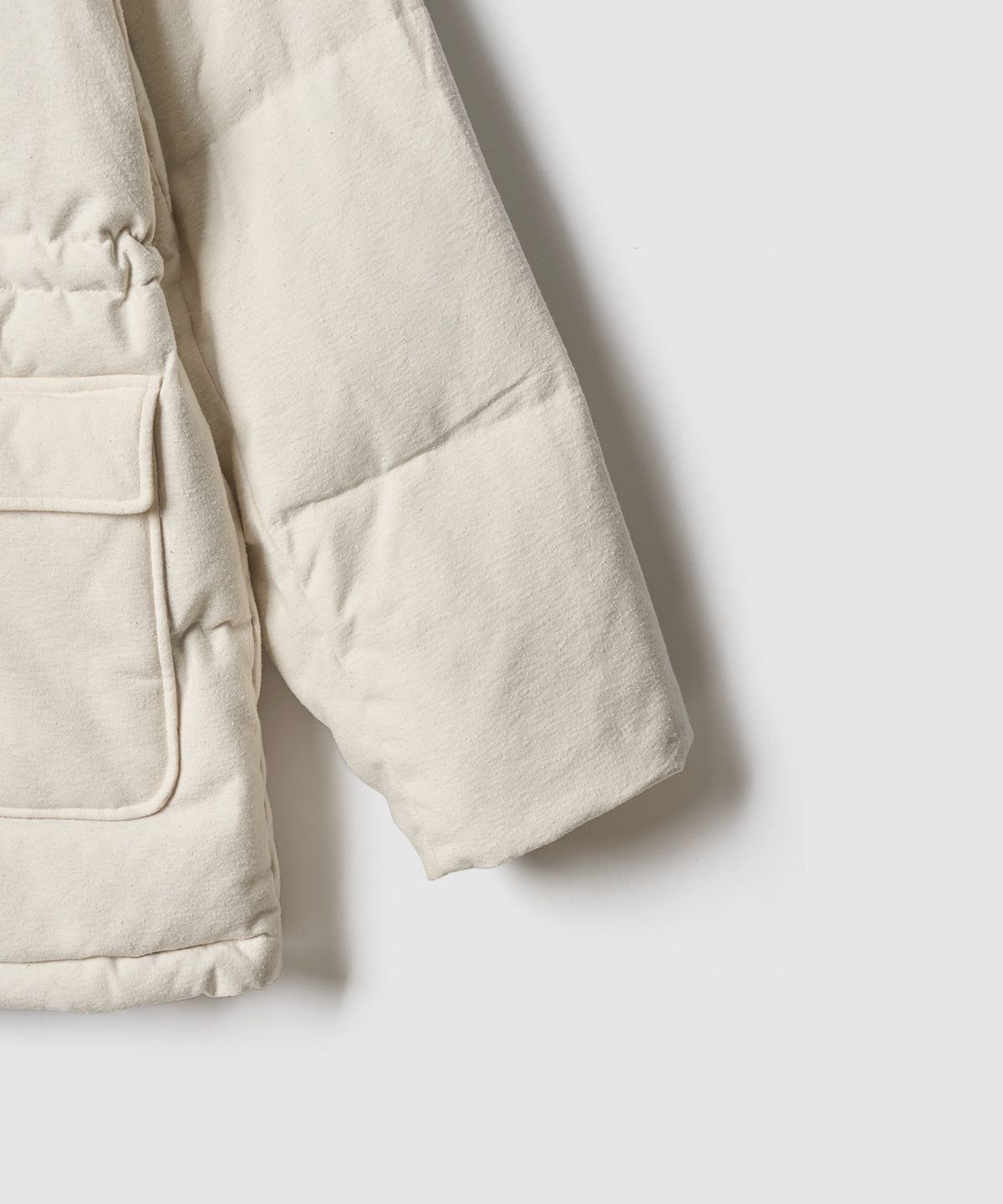 튜드먼트(TTUDEMENT) DUCK DOWN OVERFIT HALF JUMPER IVORY