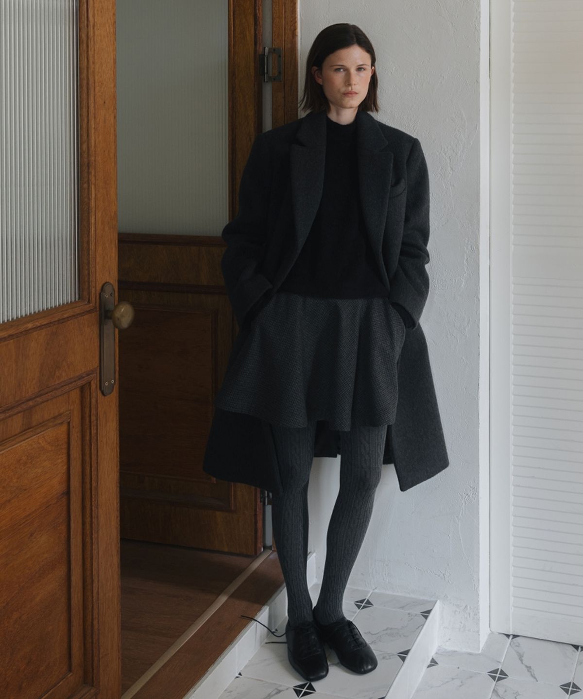 어나우트(UNNOUT) PREPPY CHECK WOOL SKIRT CHARCOAL