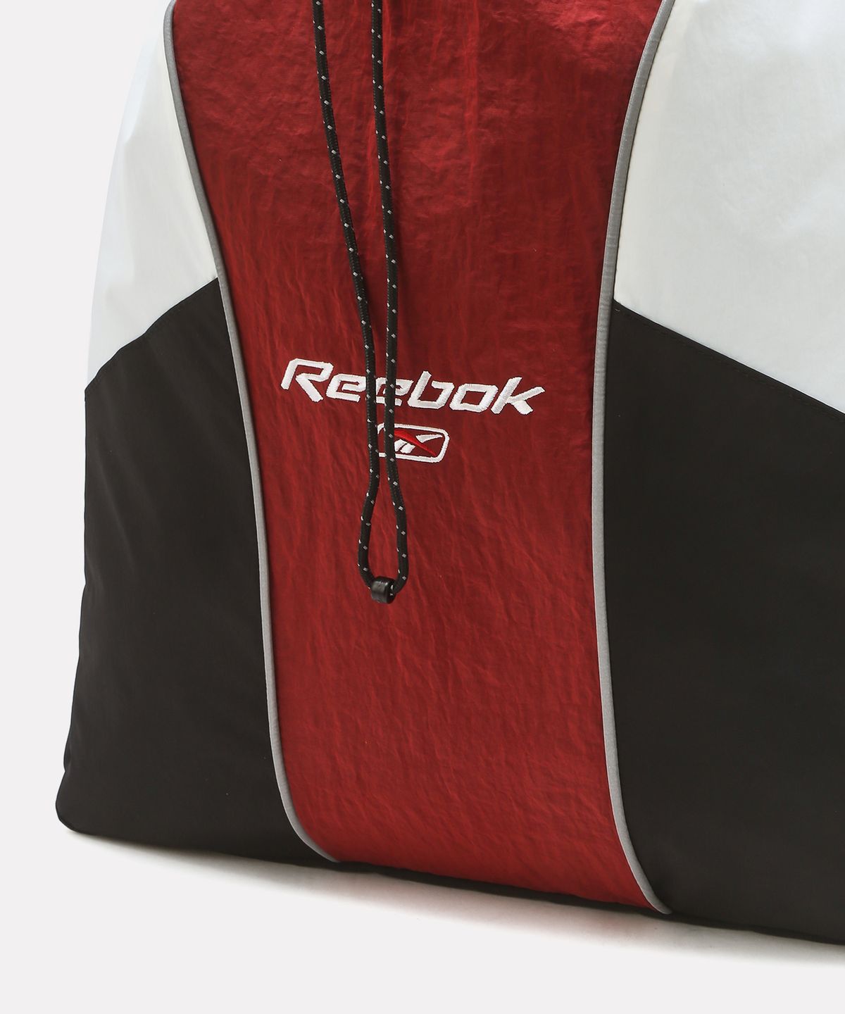 리복(REEBOK) 컬러 블록 스트링 백팩 - 다크 레드