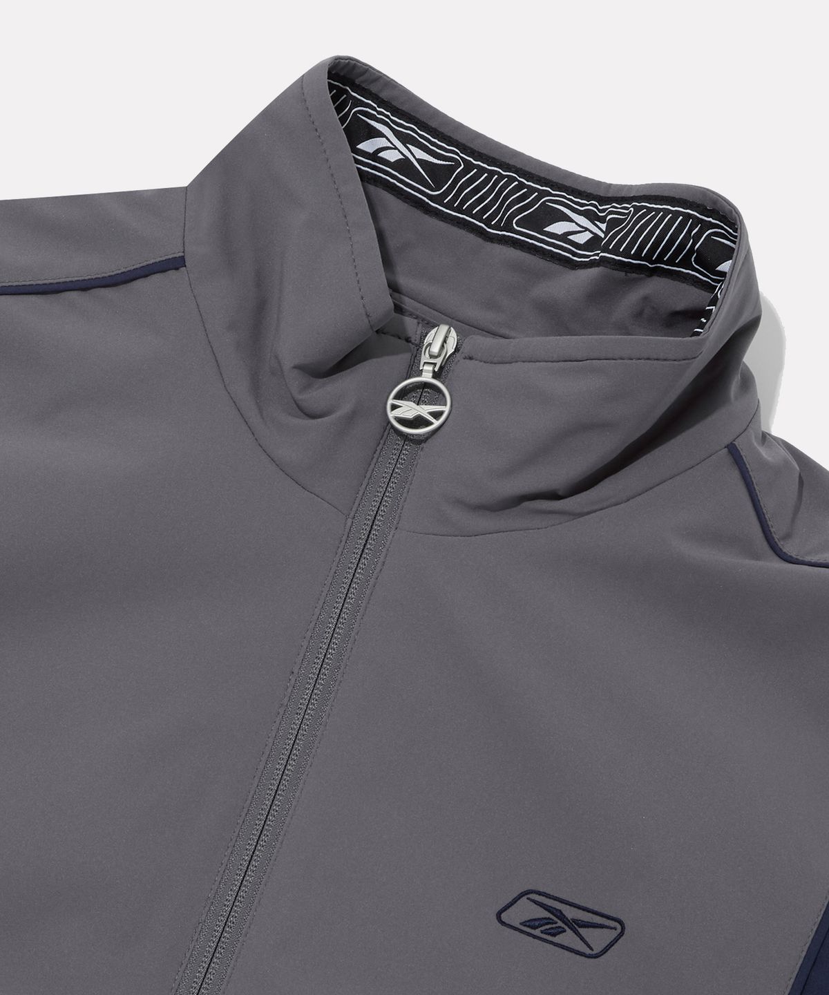 리복(REEBOK) 프리미어 웜 메쉬 윈드 브레이커 - 그레이
