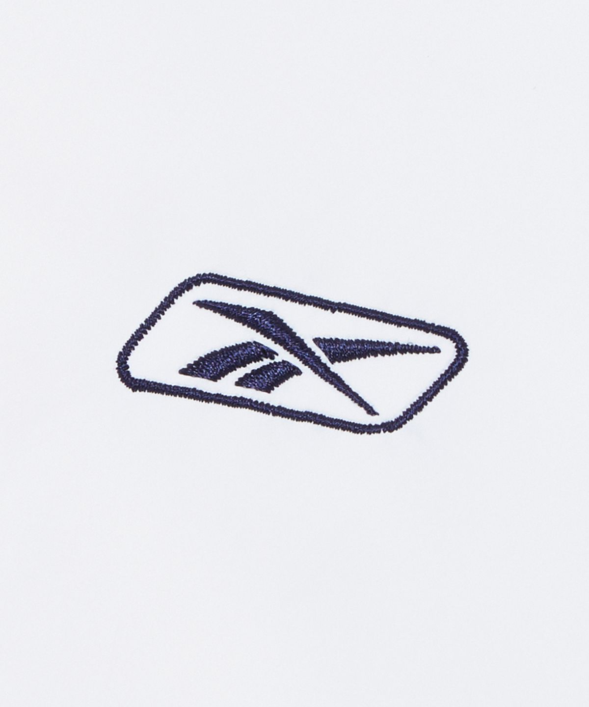 리복(REEBOK) 프리미어 크롭 트랙 경량 패딩 (W) - 오프 화이트