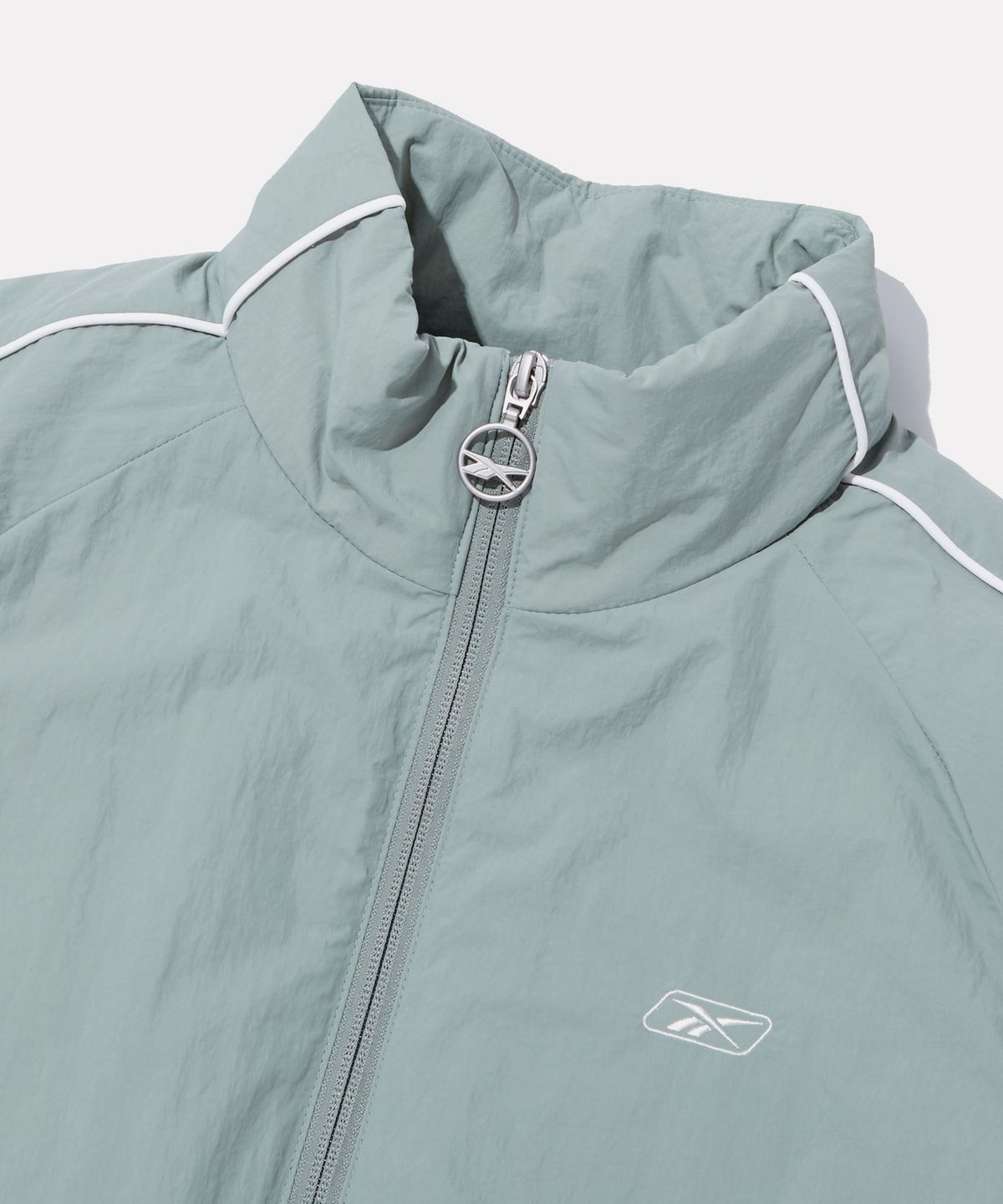 리복(REEBOK) 프리미어 크롭 트랙 경량 패딩 (W) - 민트